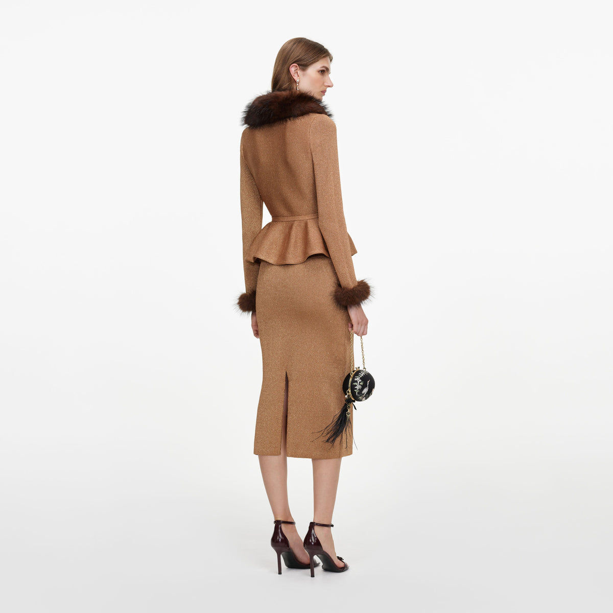 Back view of a woman wearing the Gold Fur Collar Knit Midi Dress