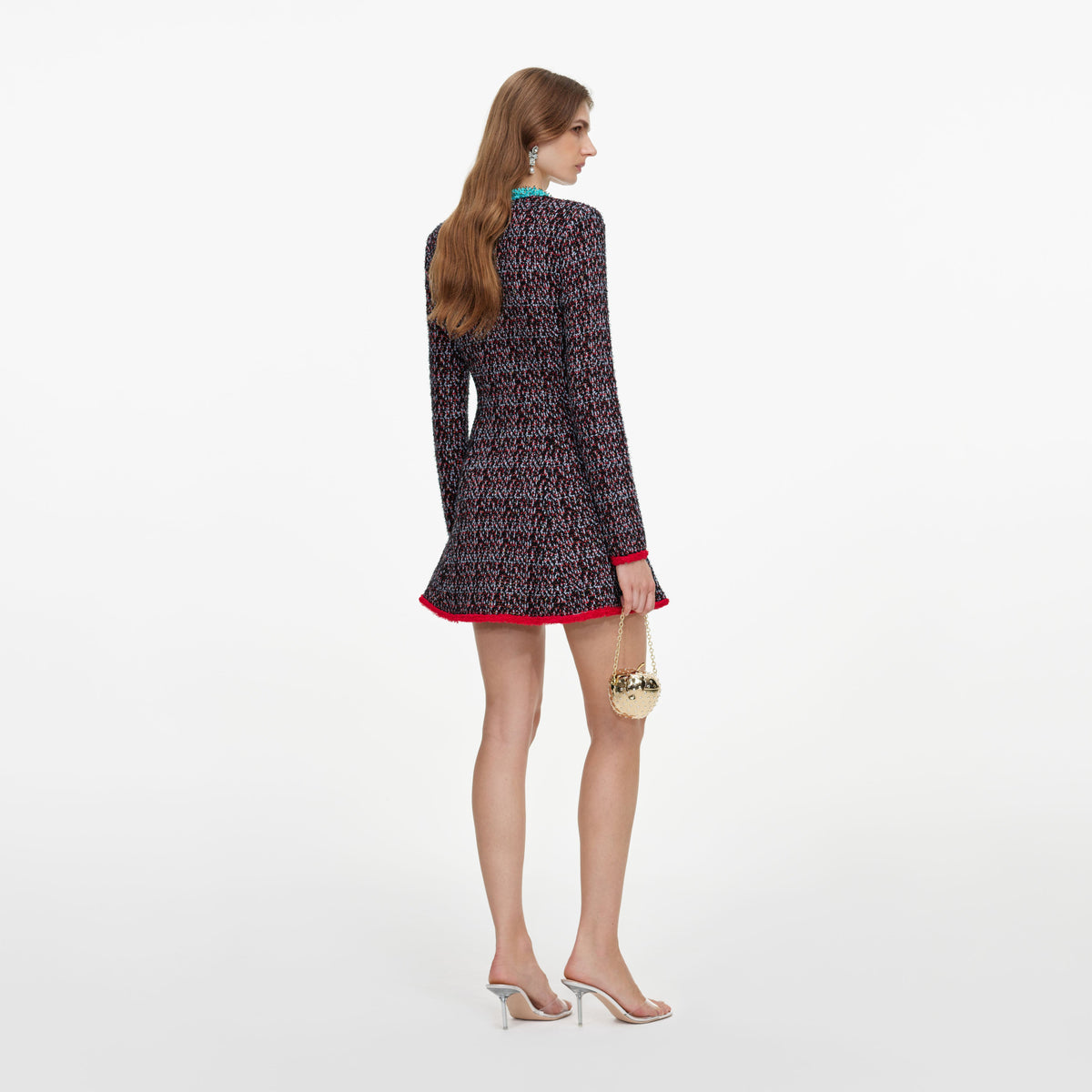 Back view of a woman wearing the Multi Textured Knit Mini Dress