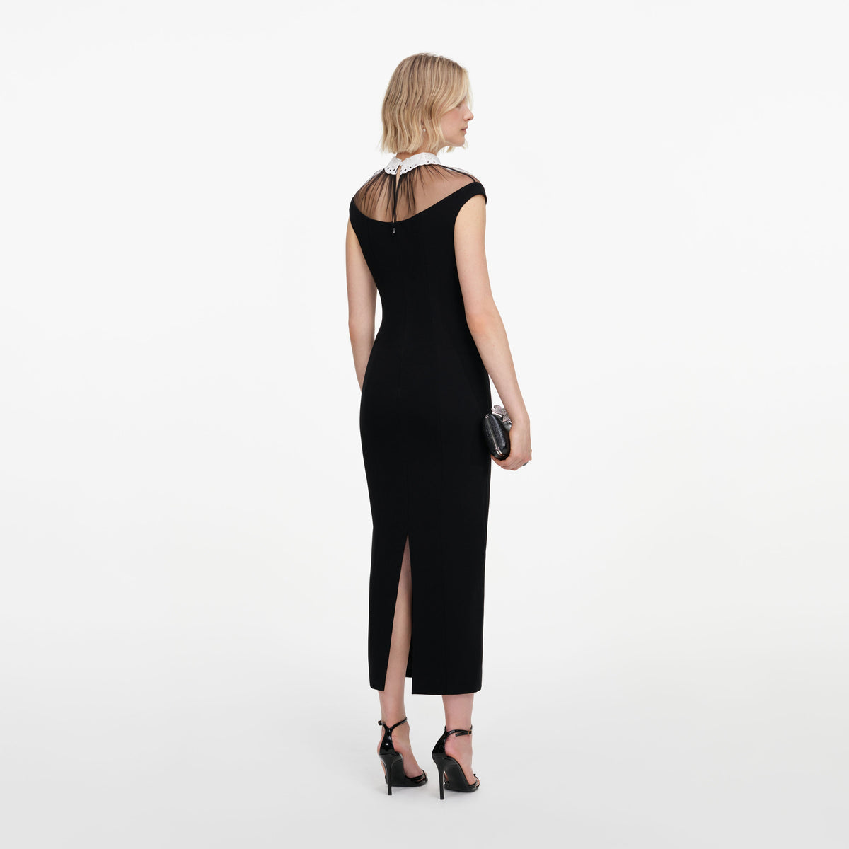 Back view of a woman wearing the Black Crepe Contrast Collar Midi Dress