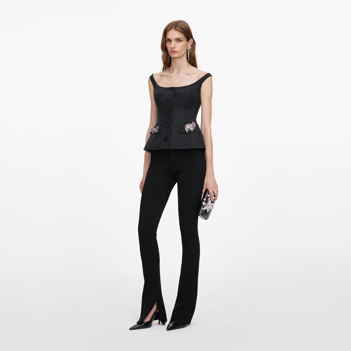 Side view of a woman wearing the Black Structured Bardot Top