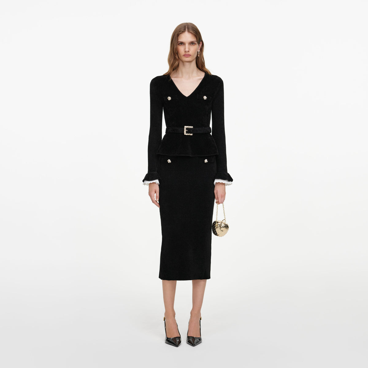 Front view of a woman wearing the Black Chenille Peplum Knit Midi Dress