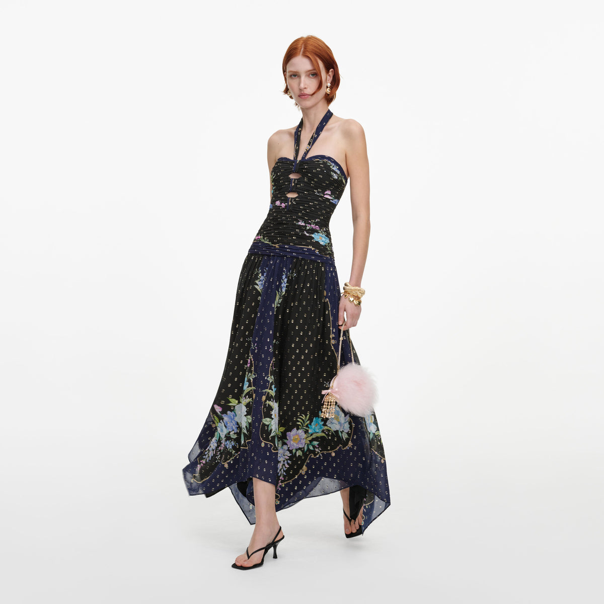 Side view of a woman wearing the Navy Metallic Chiffon Midi Dress
