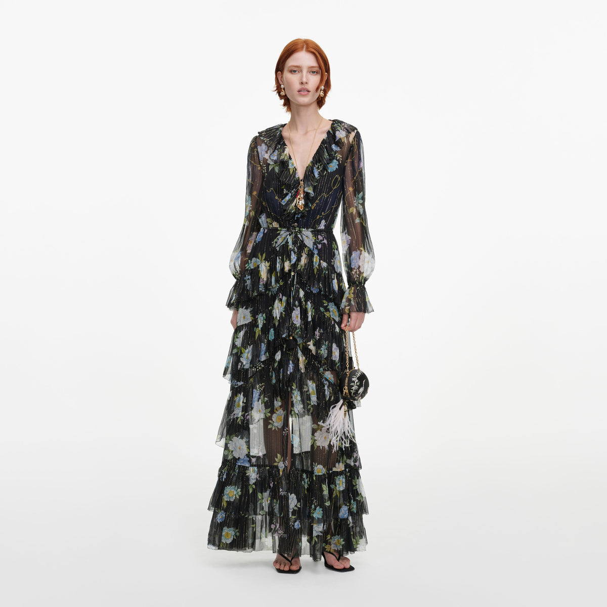 Front view of a woman wearing the Navy Floral Georgette Maxi Dress