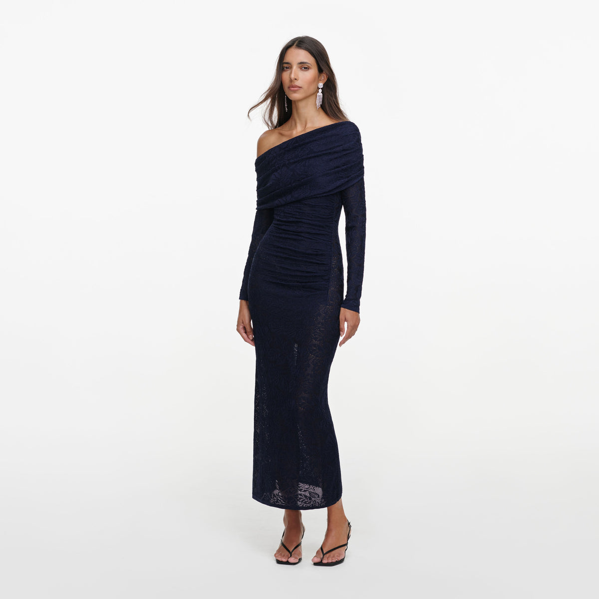 Side view of a woman wearing the Navy Jacquard Gathered Knit Midi Dress