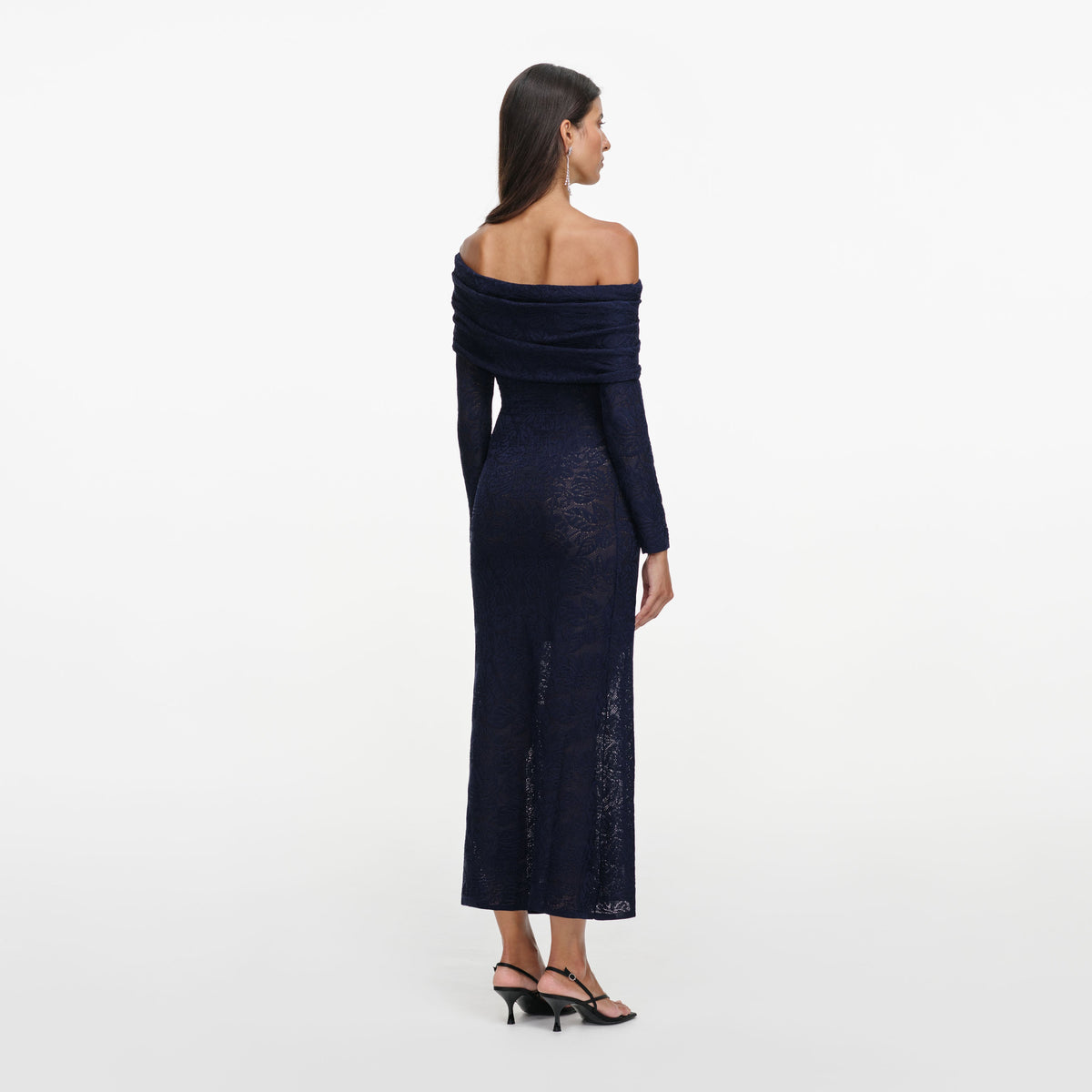 Back view of a woman wearing the Navy Jacquard Gathered Knit Midi Dress