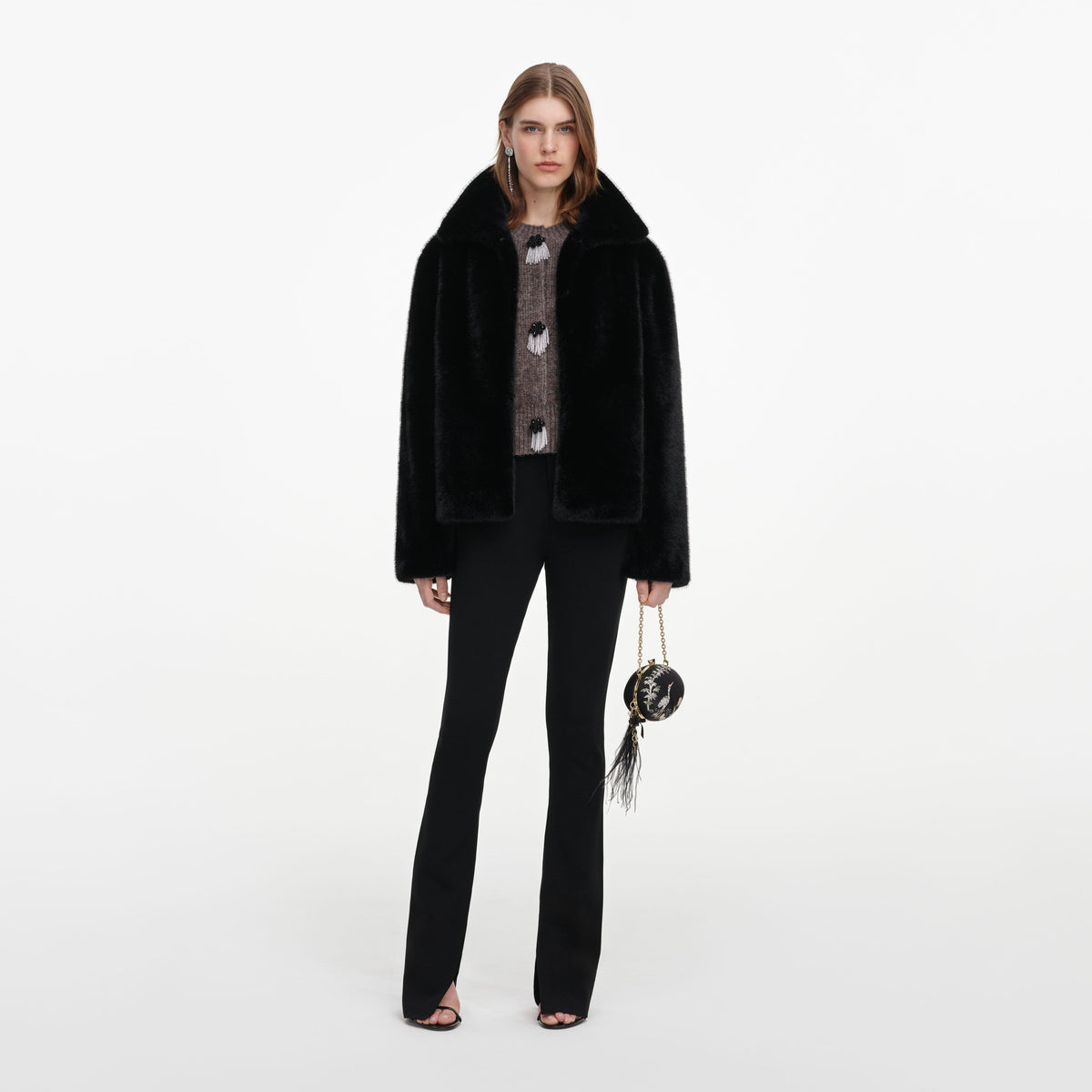 Front view of a woman wearing the Black Faux Fur Jacket