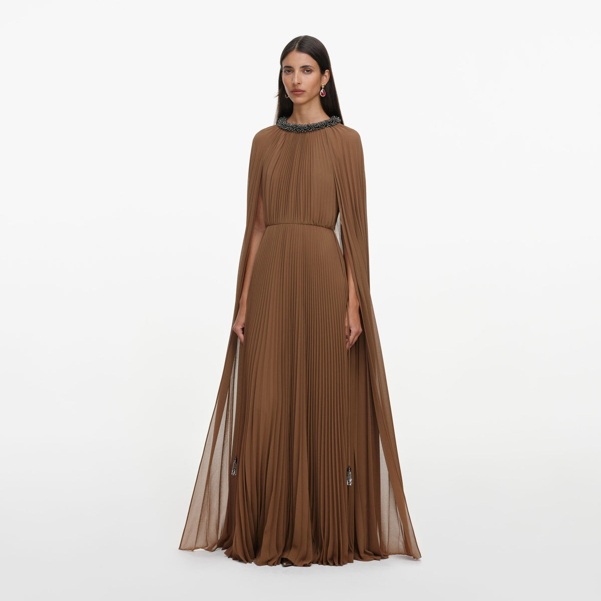 Side view of a woman wearing the Brown Georgette Cape Maxi Dress