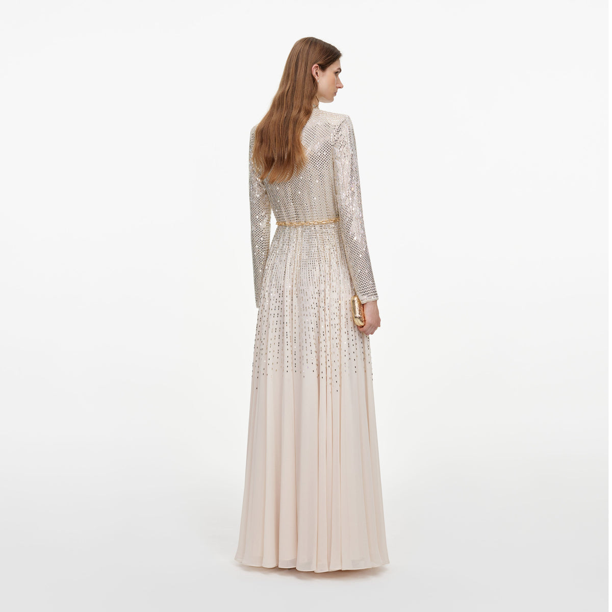 Back view of a woman wearing the Champagne Ombre Rhinestone Maxi Dress