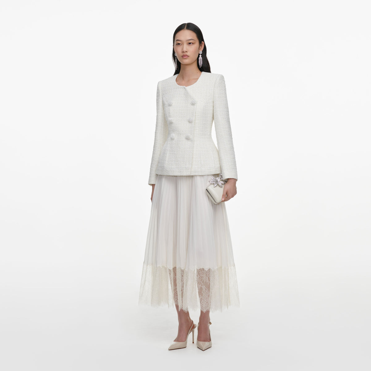 Side view of a woman wearing the Cream Boucle Wrap Midi Dress
