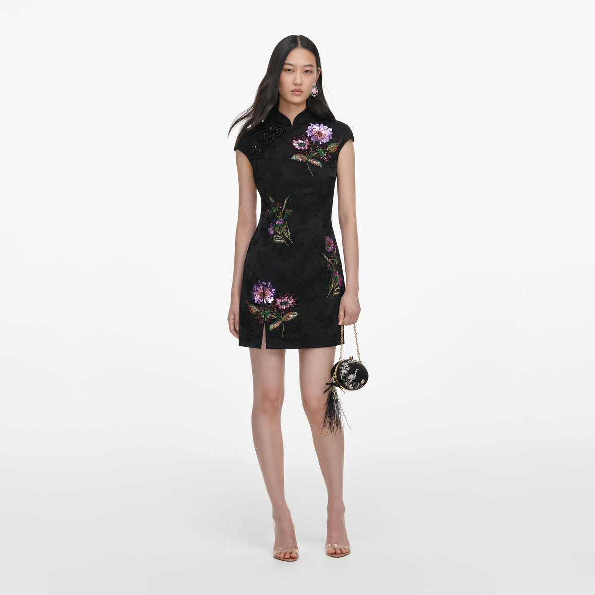 Front view of a woman wearing the Black Jacquard Sequin Embroidered Mini Dress