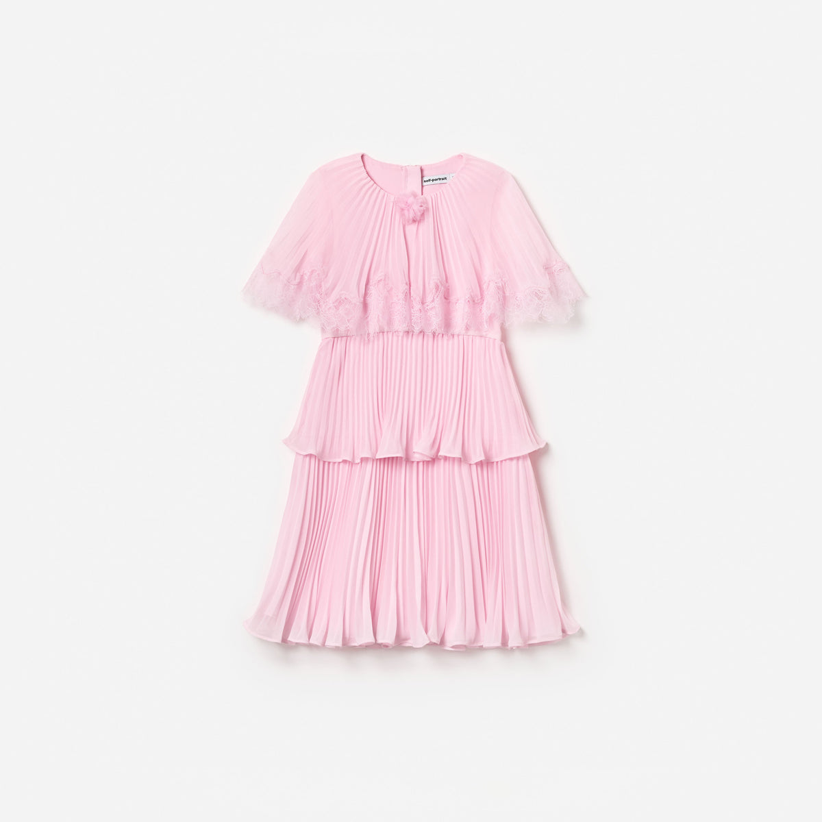 Front view of a girl wearing the Pink Chiffon Tiered Cape Dress