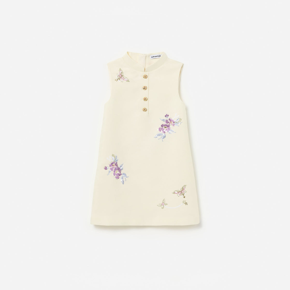 Front view of a girl wearing the Cream Floral Jacquard Sleeveless Dress