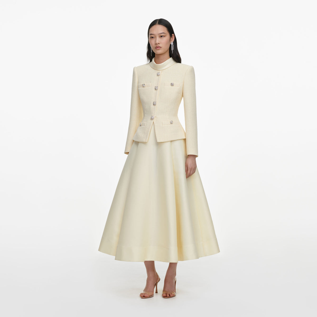 Side view of a woman wearing the Yellow Boucle And Taffeta Midi Dress