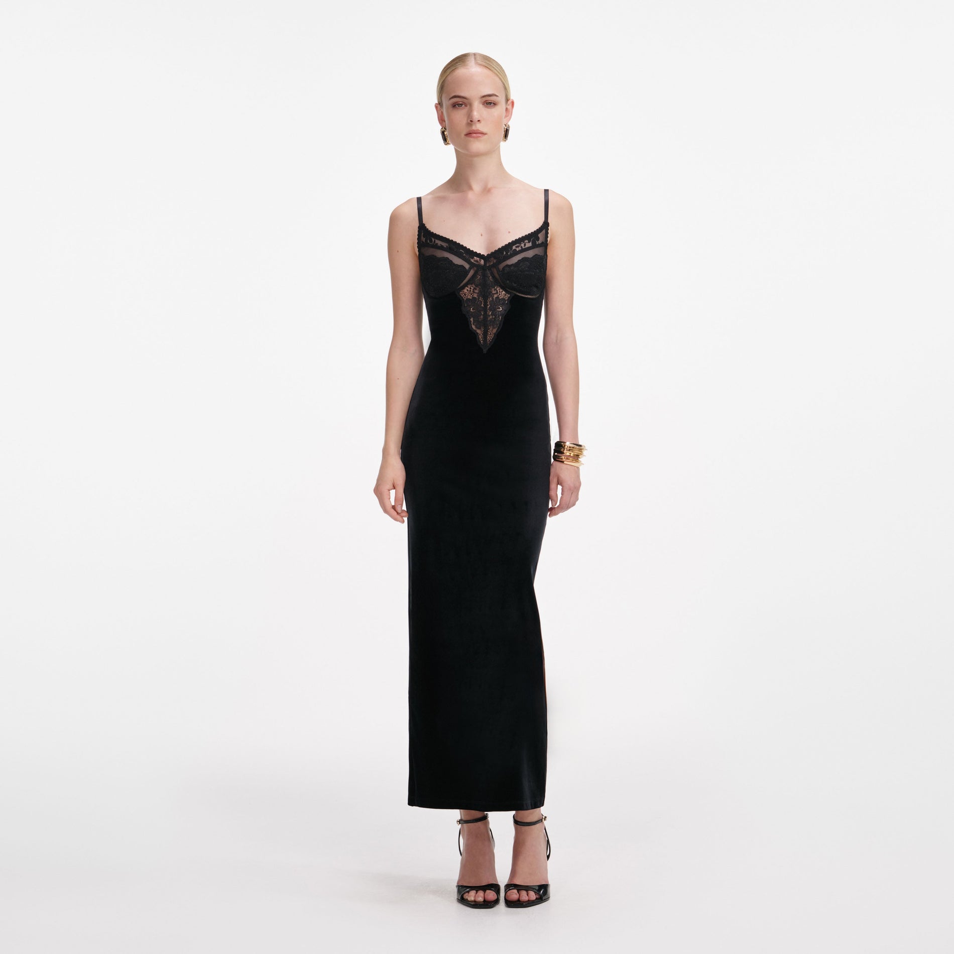 Front view of a woman wearing the Black Velvet Strappy Midi Dress