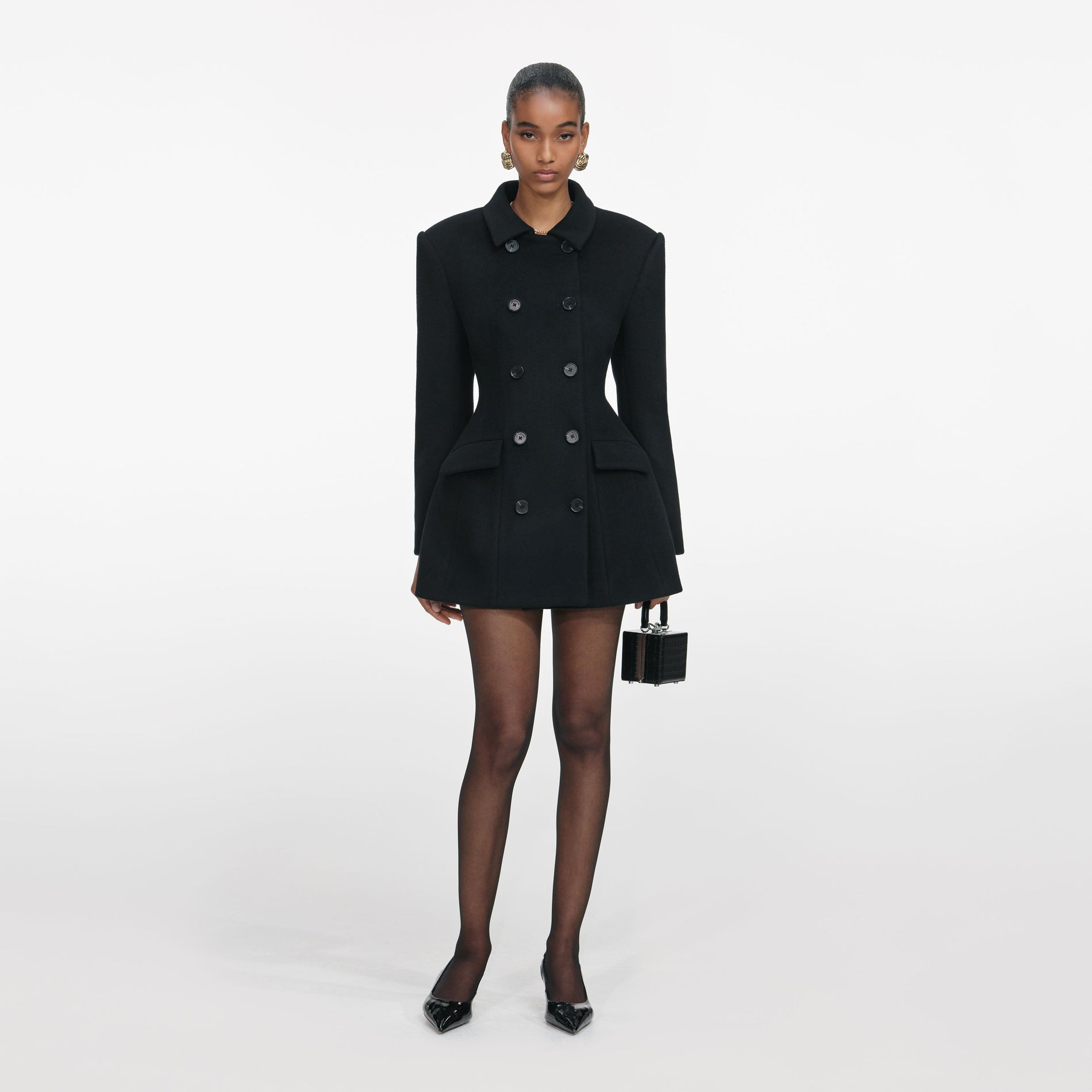 Front view of a woman wearing the Black Wool Double Breasted Jacket