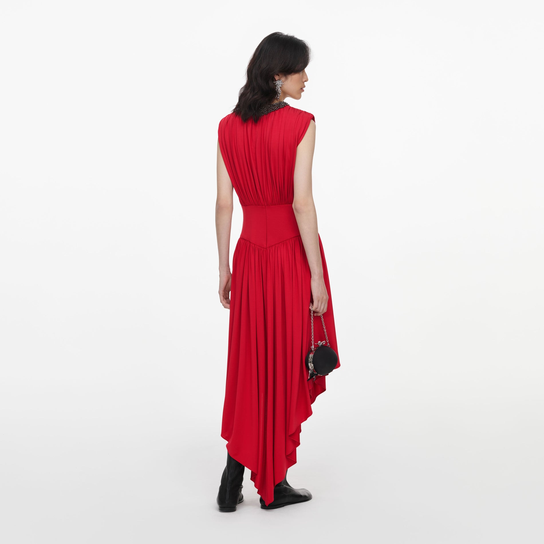 Back view of a woman wearing the Red Jersey Drape Asymmetric Midi Dress