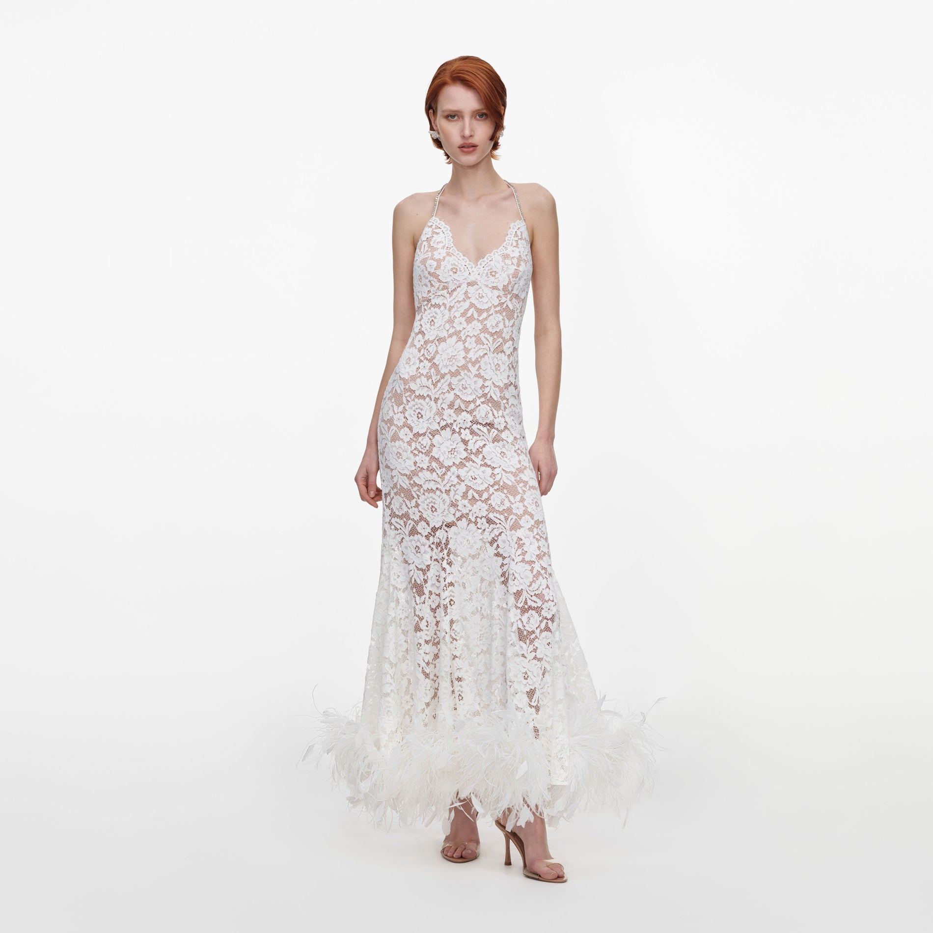Front view of a woman wearing the White Fine Lace Feather Maxi Dress