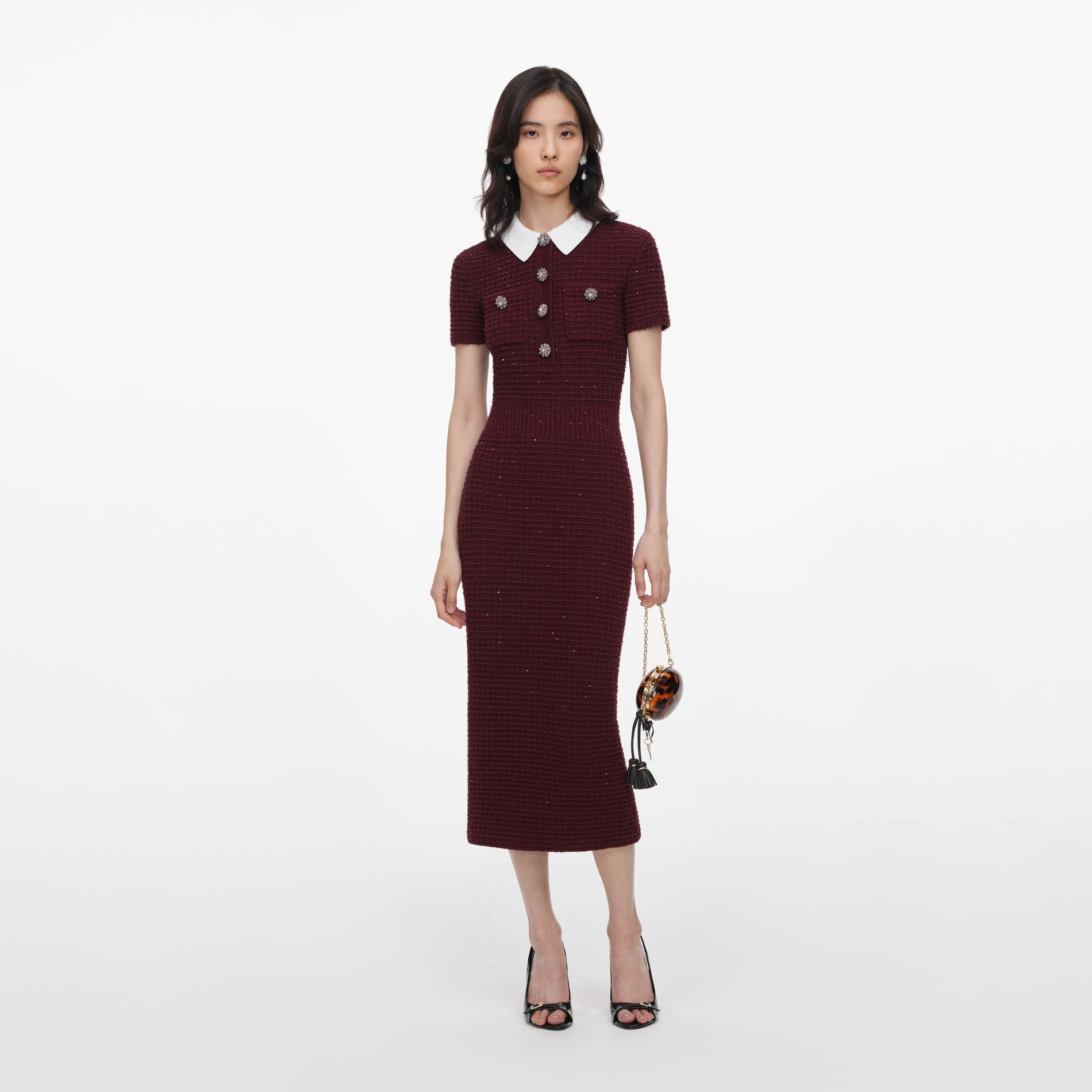 Front view of a woman wearing the Burgundy Textured Knit Midi Dress