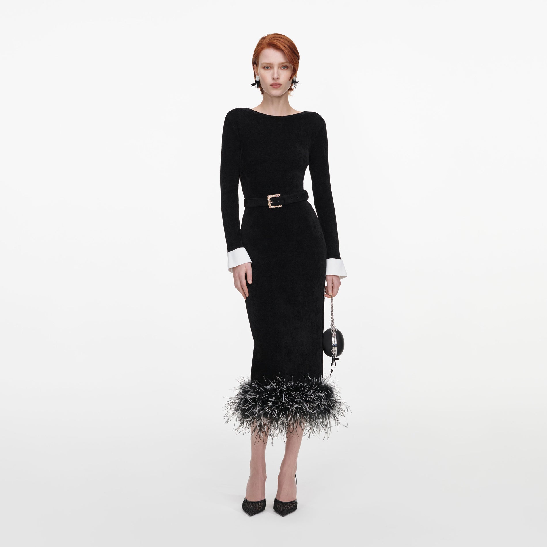 Front view of a woman wearing the Black Chenille Knit Feather Midi Dress