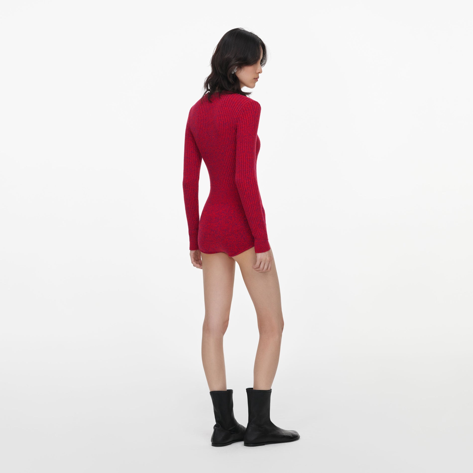 Back view of a woman wearing the Red Flower Knit Playsuit