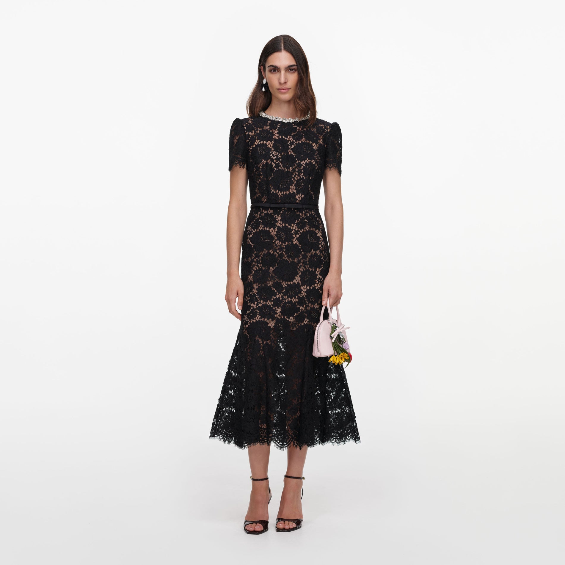 Front view of a woman wearing the Black Sequin Lace Midi Dress