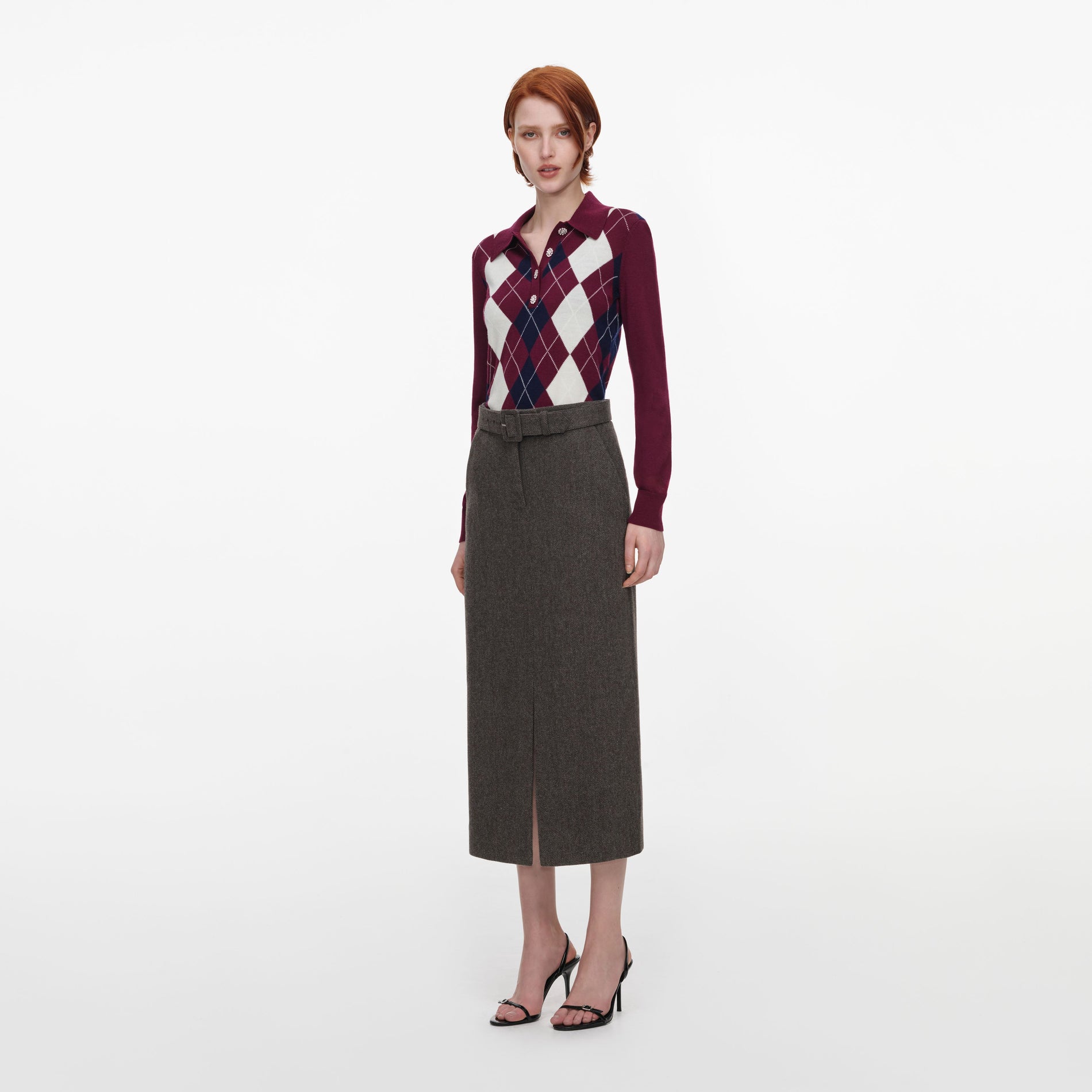 Side view of a woman wearing the Burgundy Argyle Lightweight Jumper