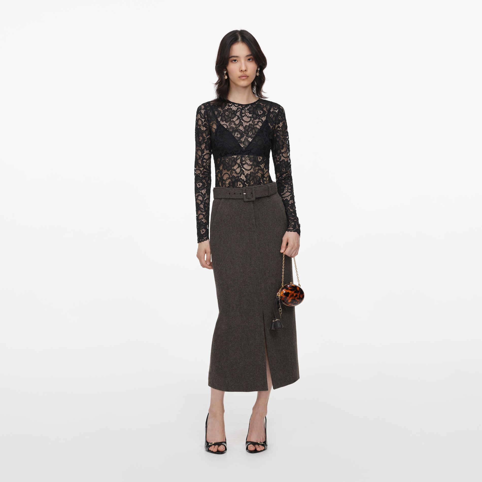 Front view of a woman wearing the Brown Wool Midi Skirt