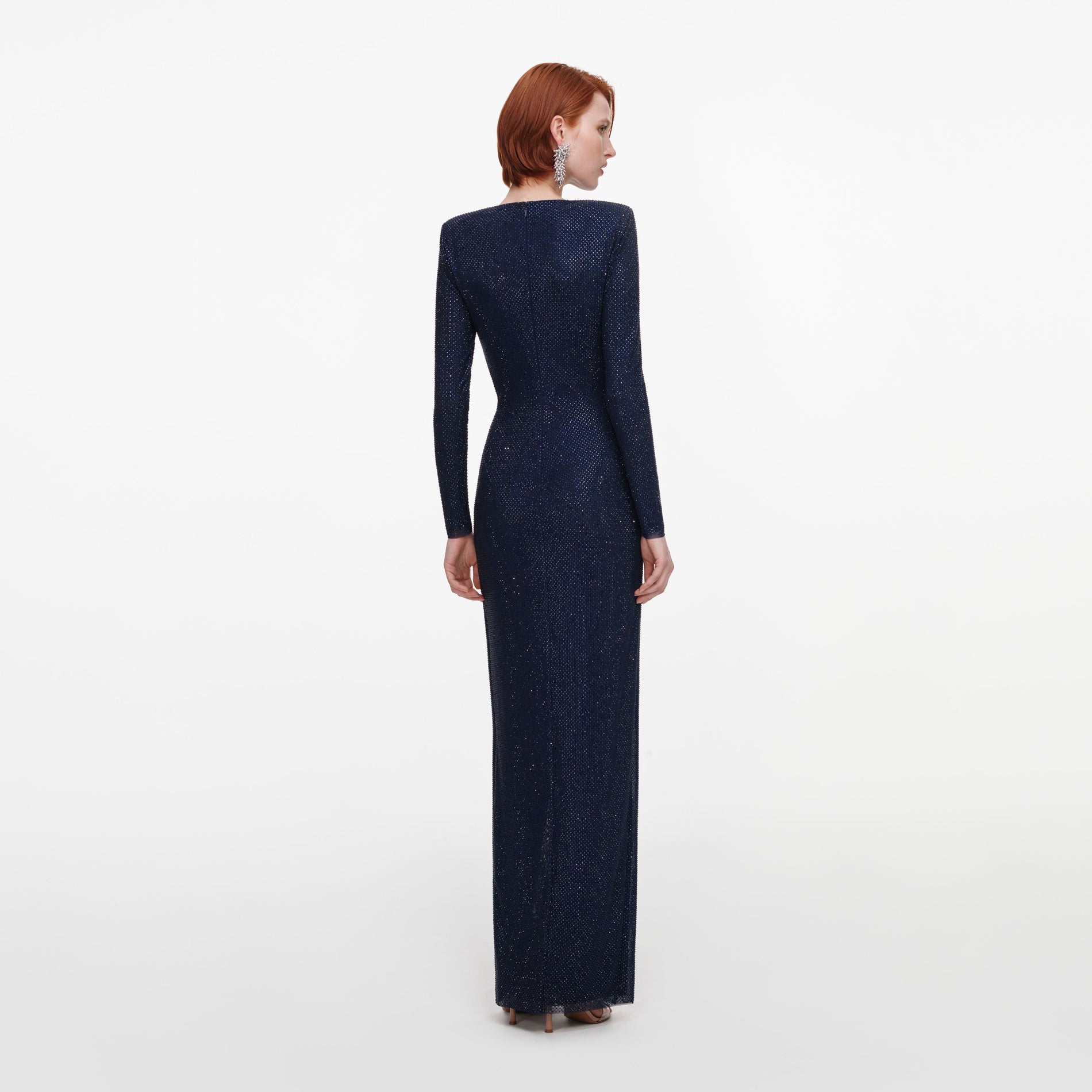 Back view of a woman wearing the Navy Rhinestone Embellished Maxi Dress