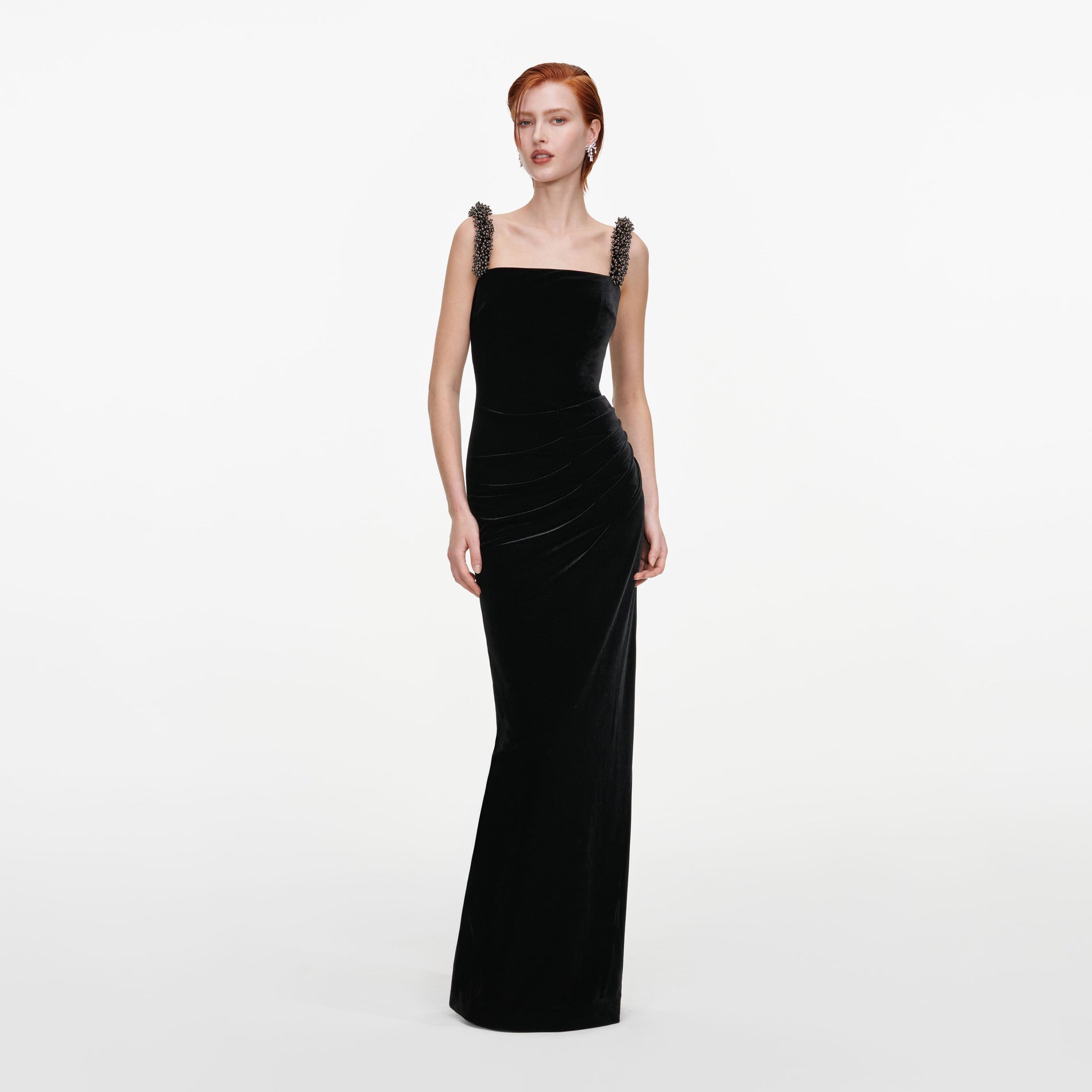 Front view of a woman wearing the Black Velvet Square Neck Maxi Dress