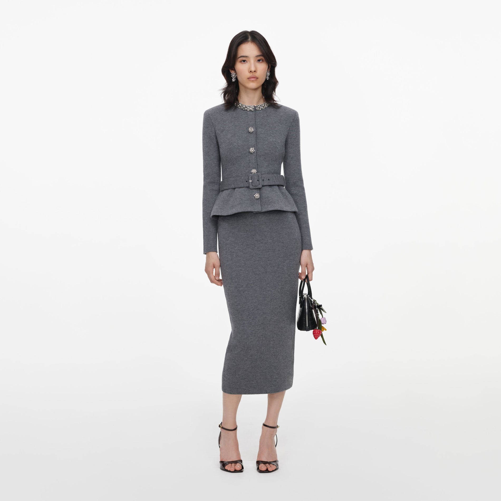 Front view of a woman wearing the Grey Crystal Trim Knit Midi Dress