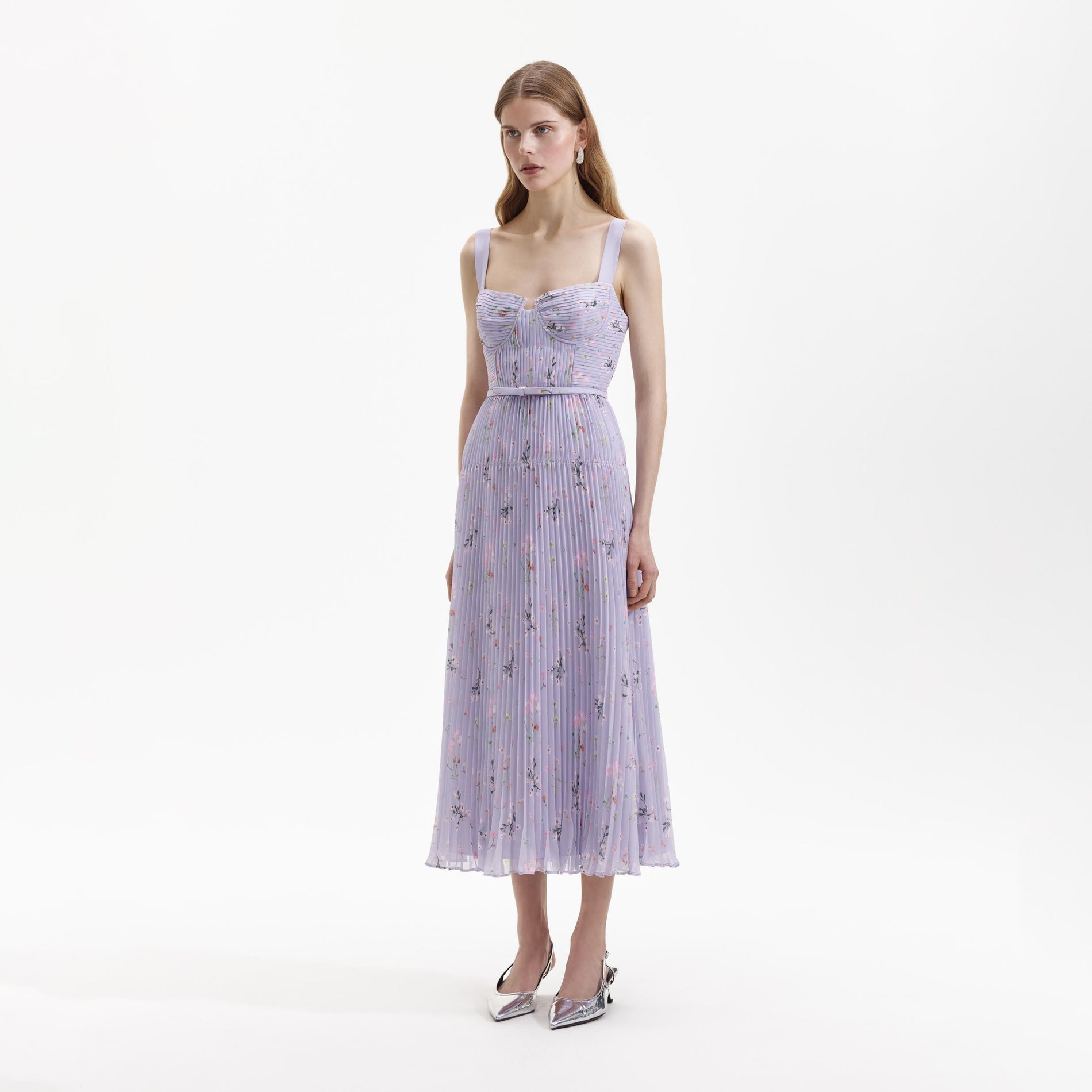 Side view of a woman wearing the Lilac Floral Chiffon Midi Dress