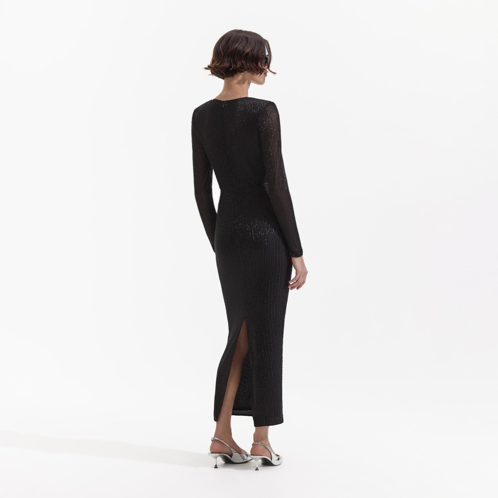 Back view of a woman wearing the Black Beaded Mesh Midi Dress