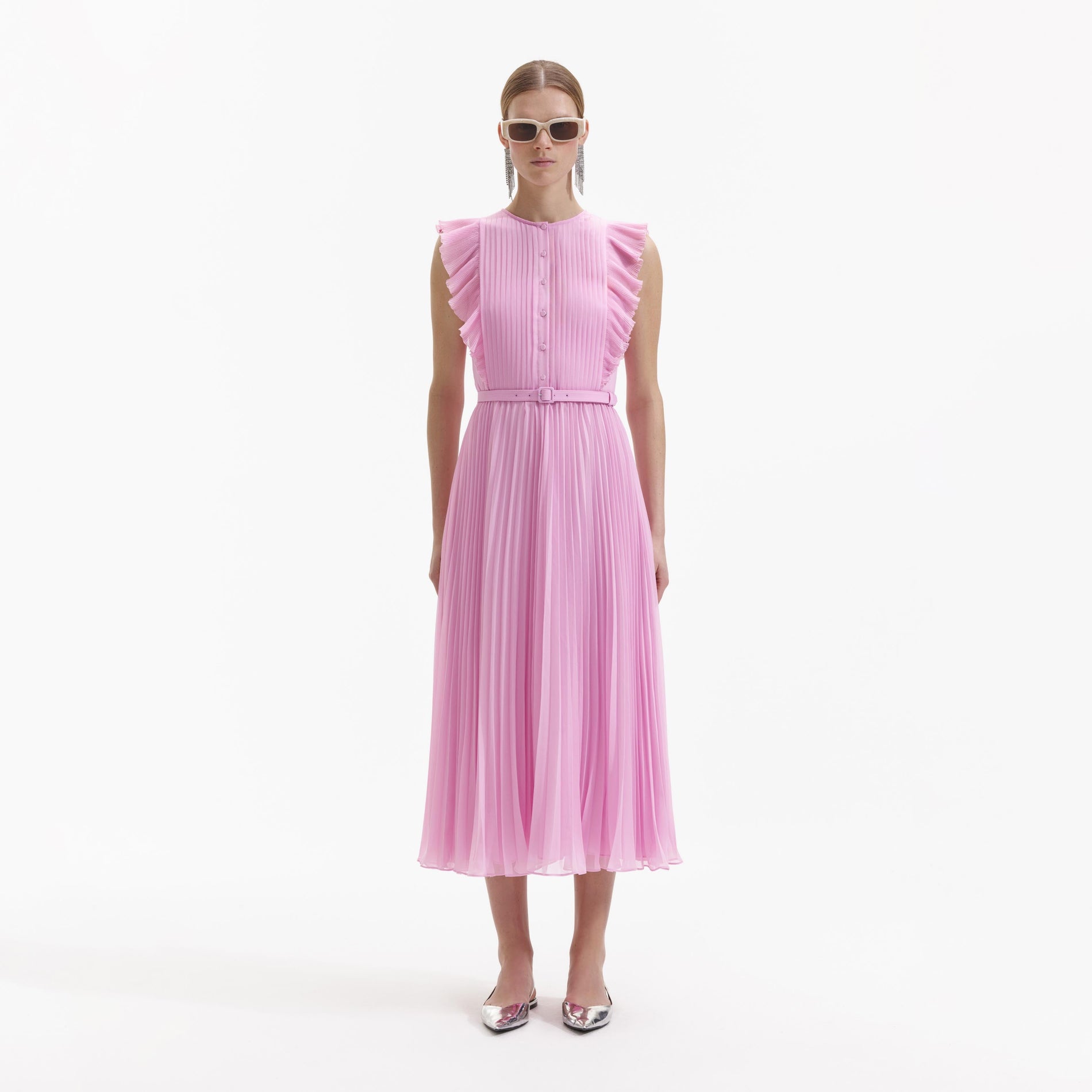 A Woman wearing the Pink Chiffon Sleeveless Tunic Ruffle Midi Dress