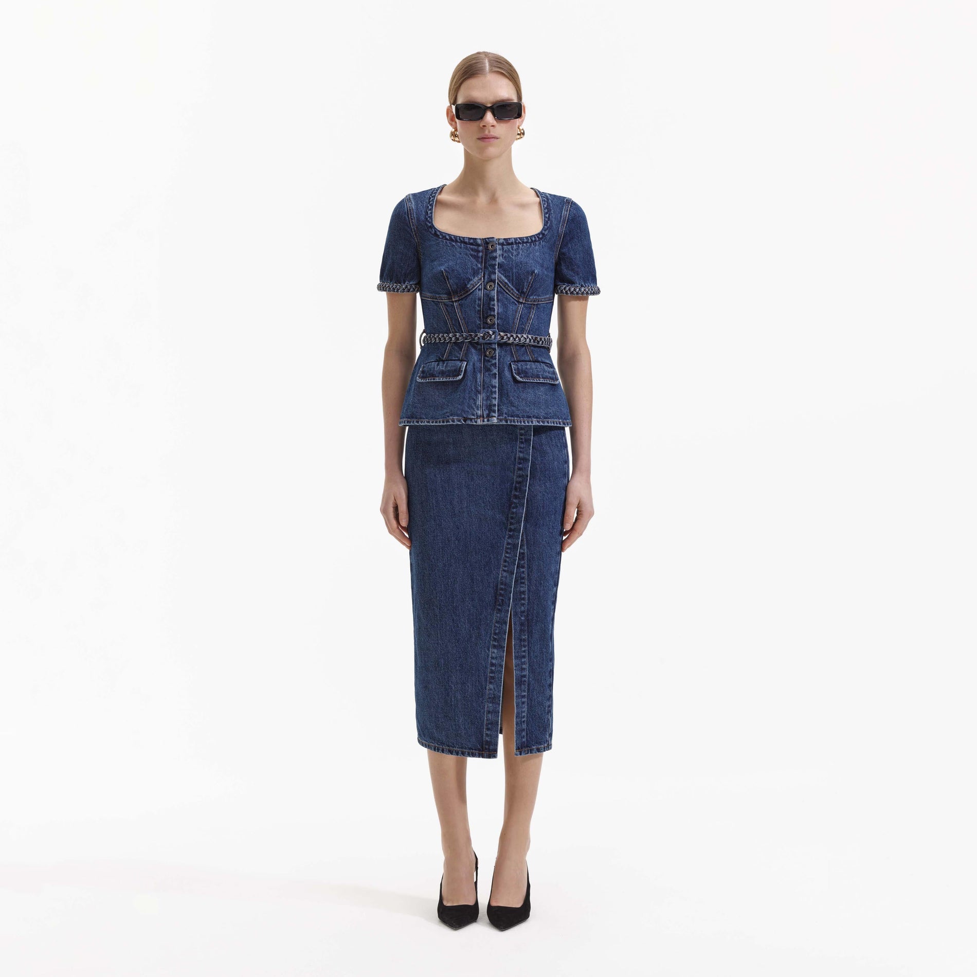 Front view of a woman wearing the Denim Midi Dress