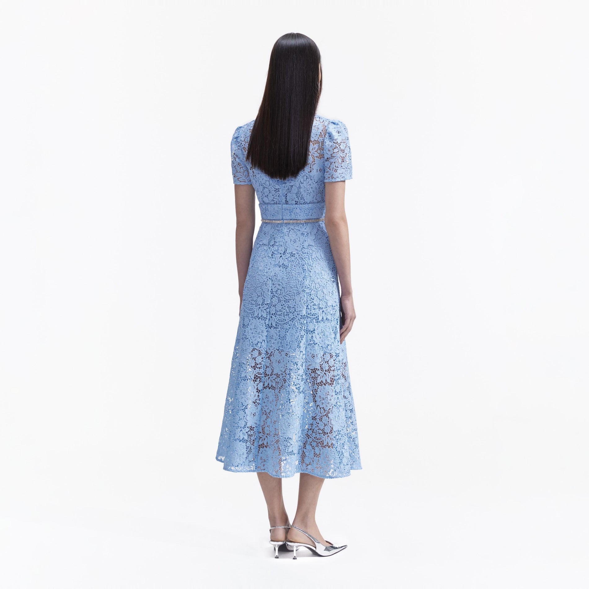 A Woman wearing the Blue Cord Lace Bow Midi Dress