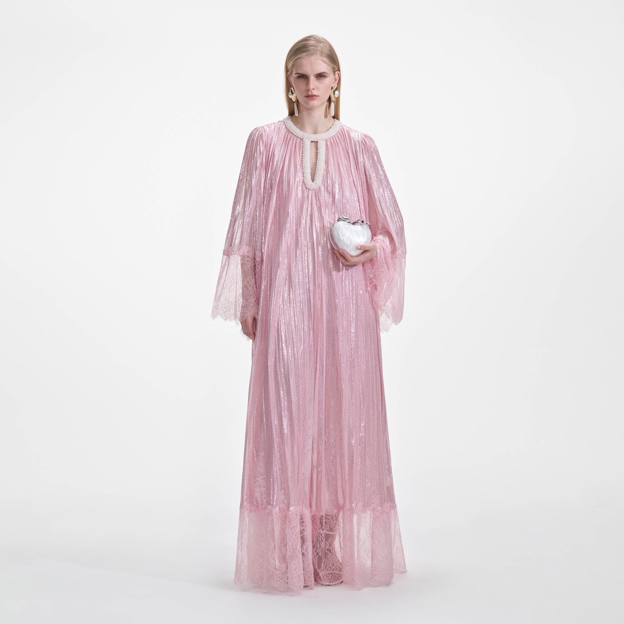 Front view of a woman wearing the Pink Metallic Pearl Maxi Dress