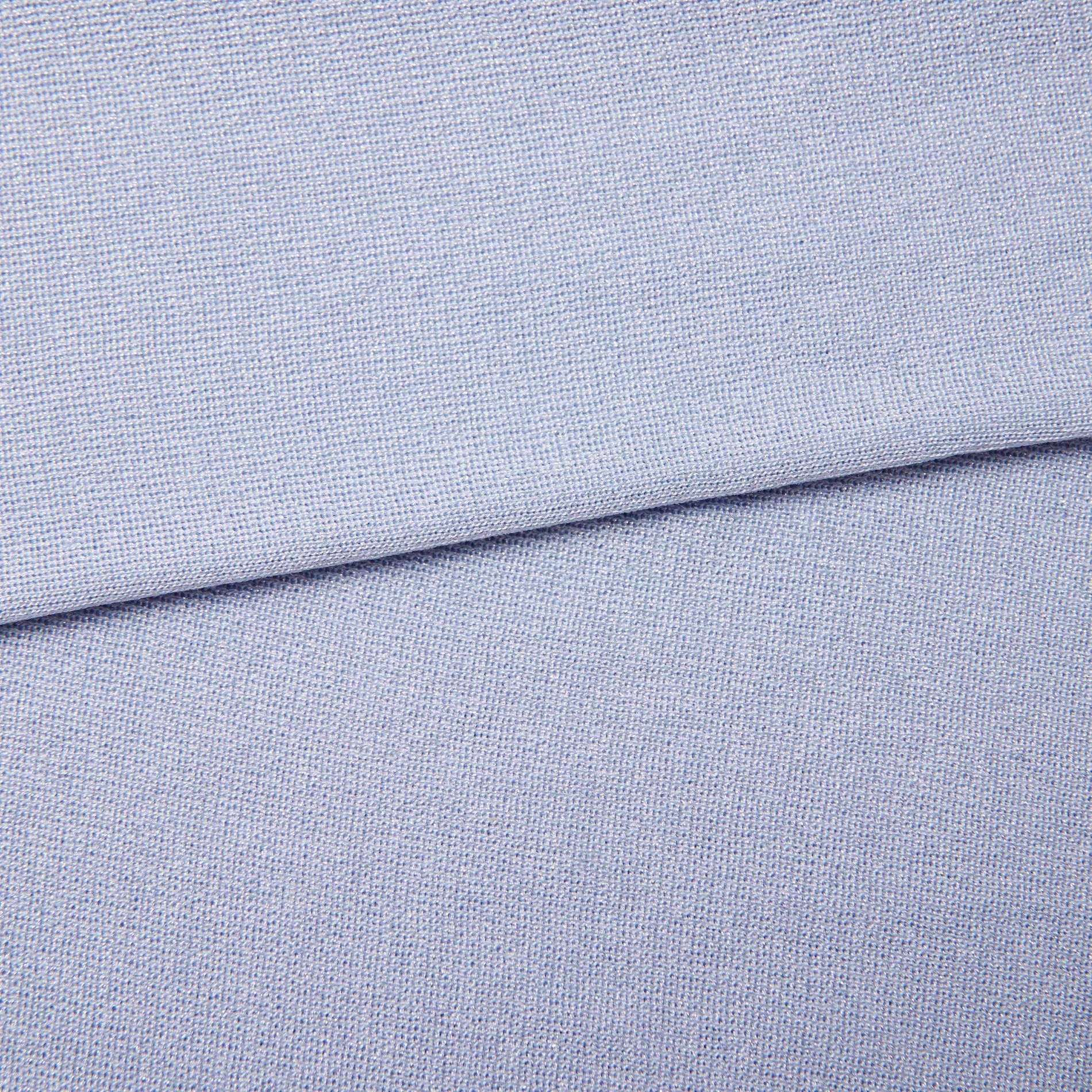 Side view of a woman wearing the Blue Viscose Knit Midi Skirt