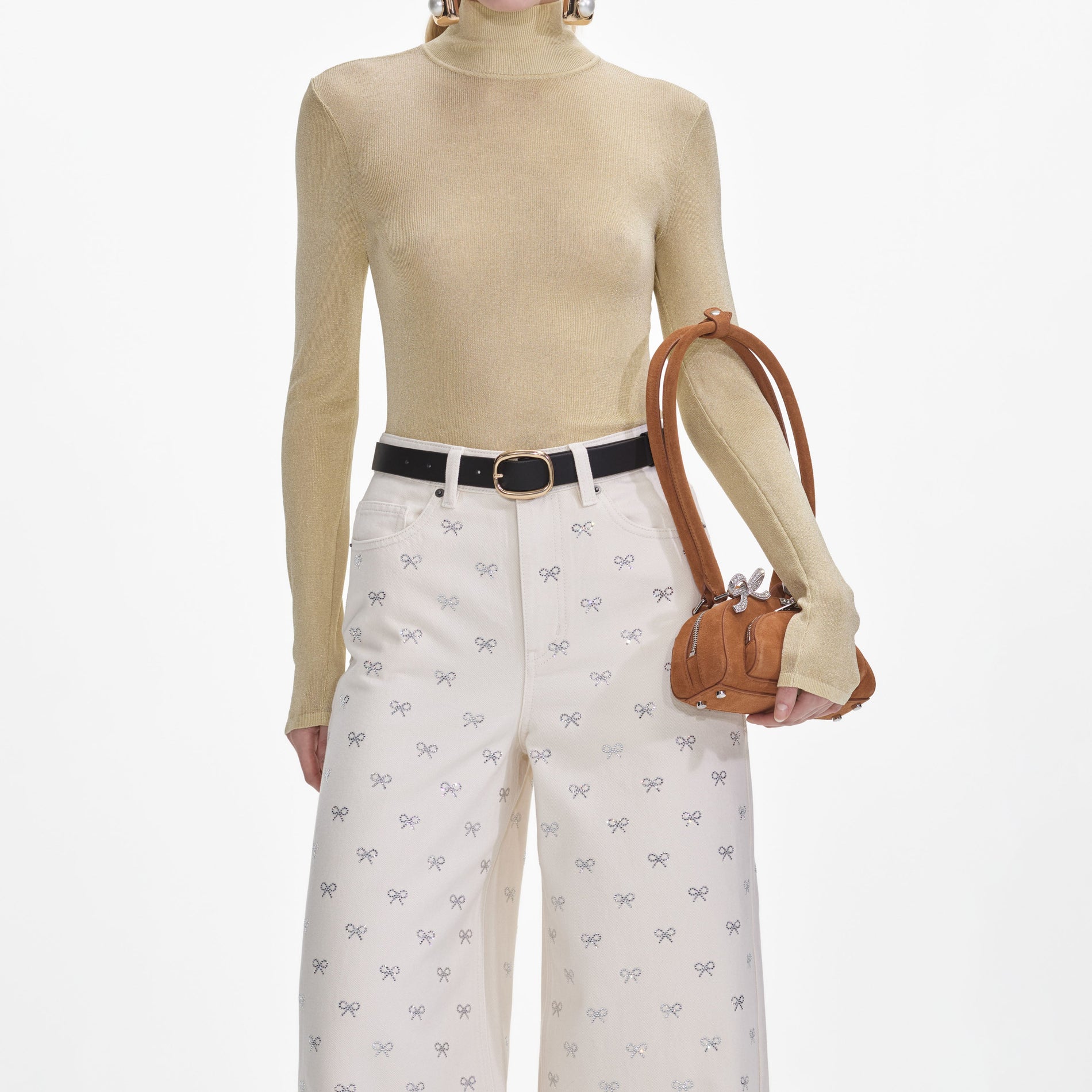 A close up of a woman wearing the Yellow Viscose Knit Top