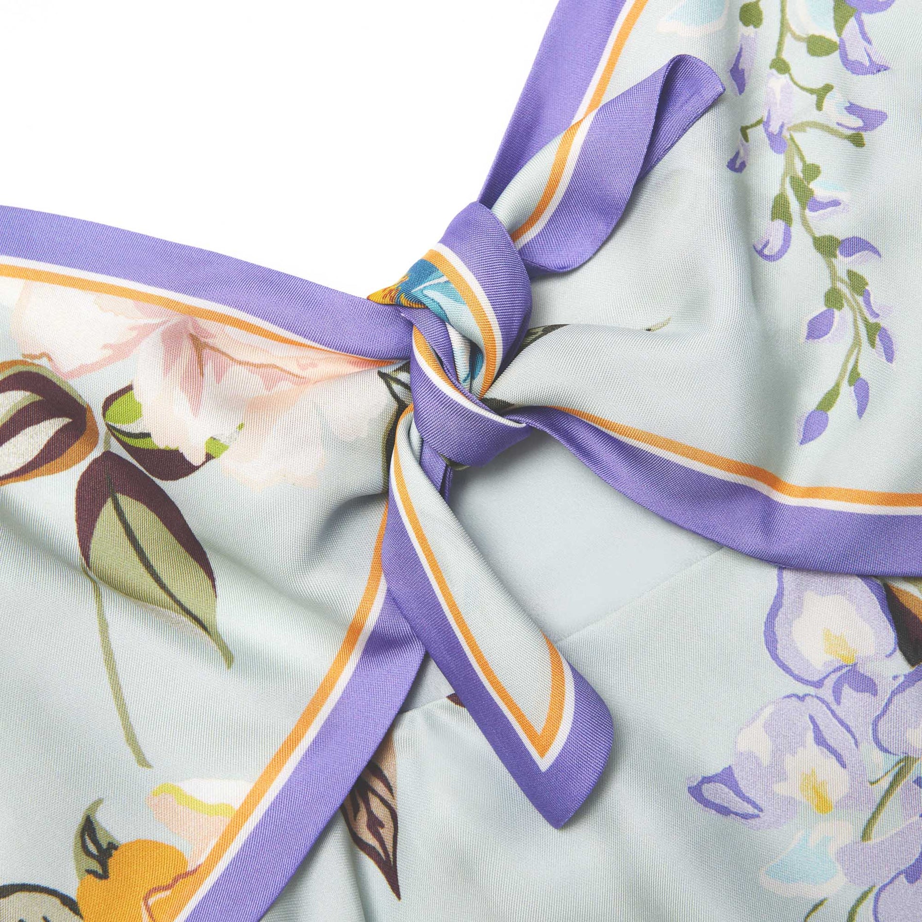 Side view of a woman wearing the Blue Floral Silk Twill Midi Dress