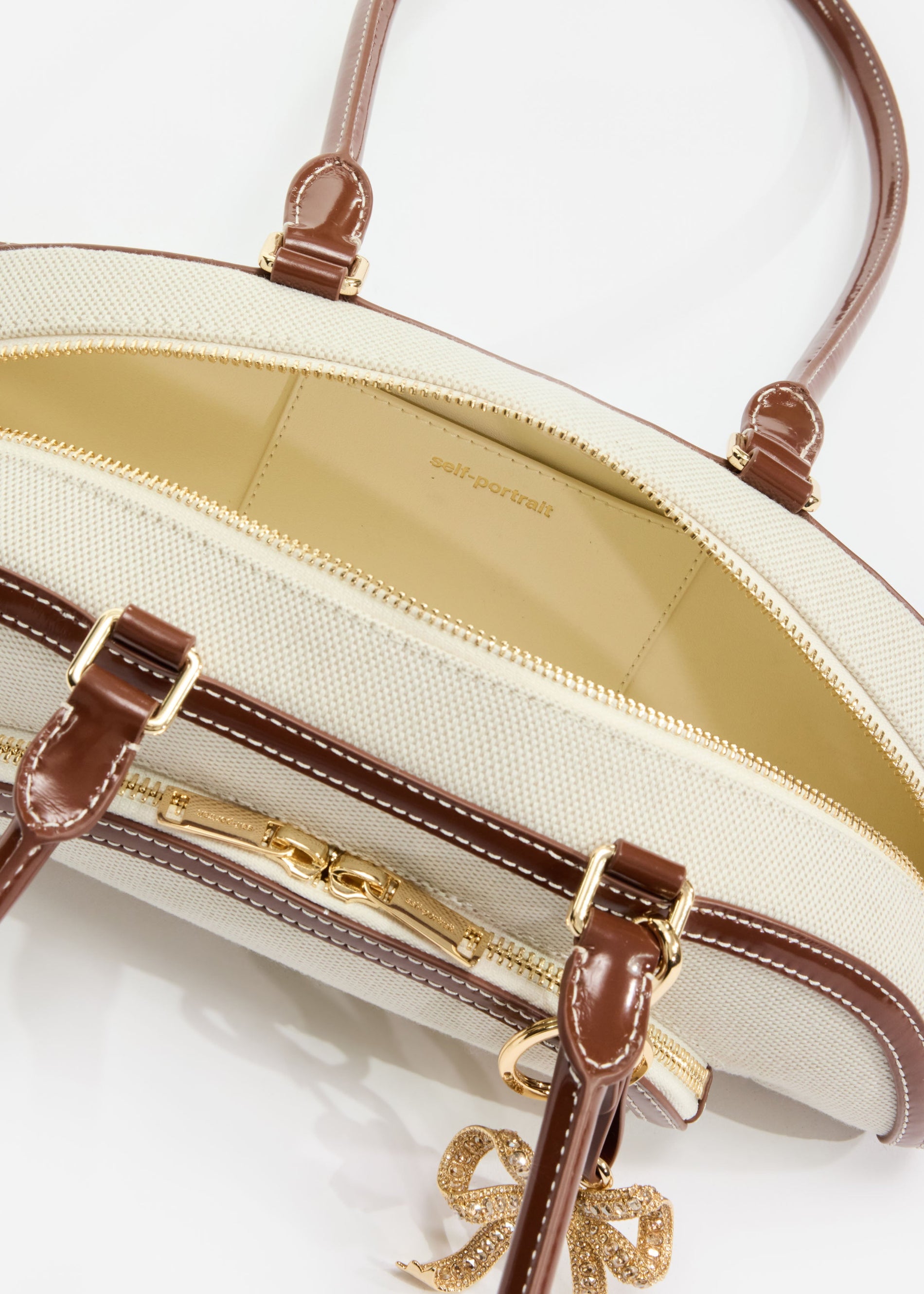 A photo of the Canvas Curved Shoulder Bag