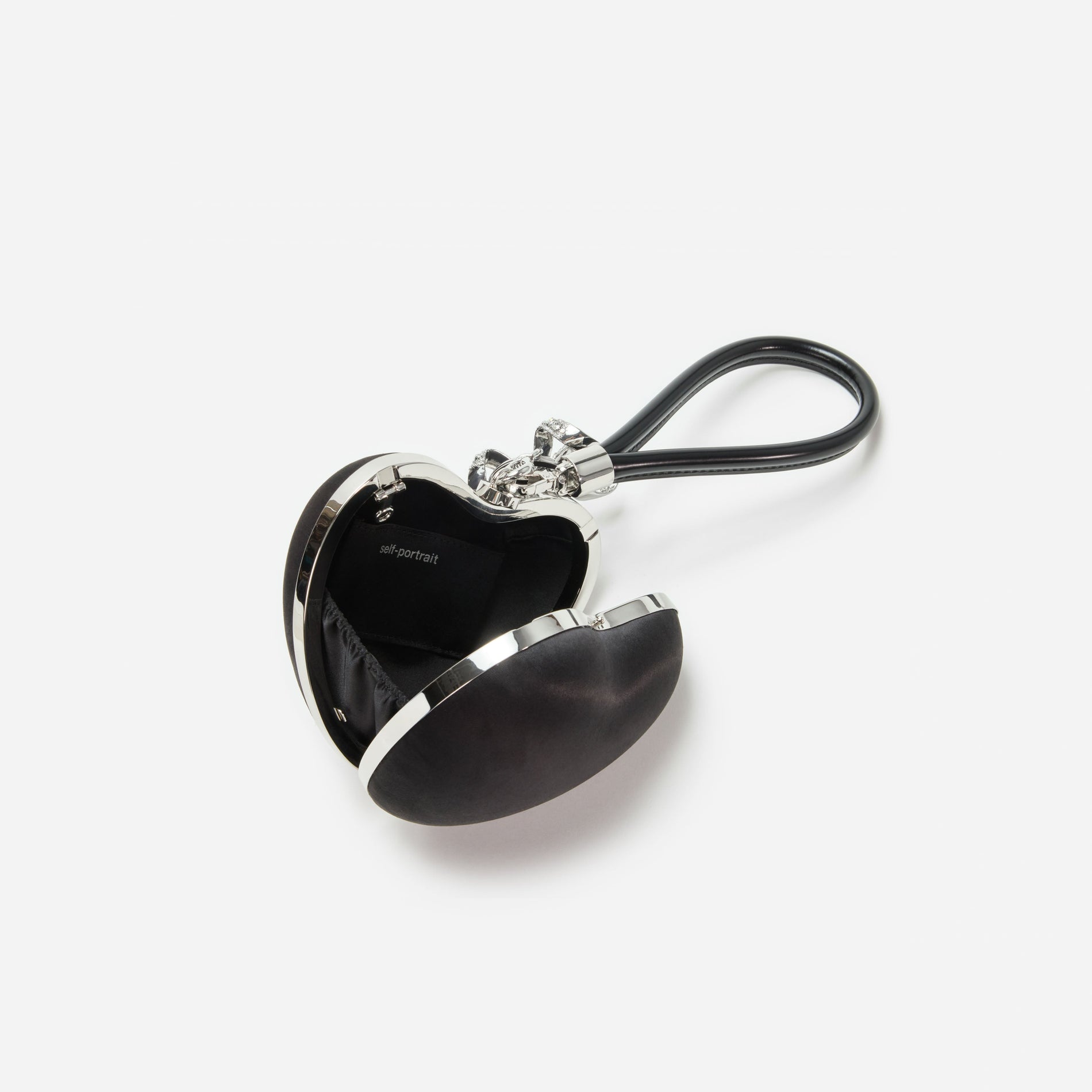 A photo of the Black Satin Top Handle Heart Clutch