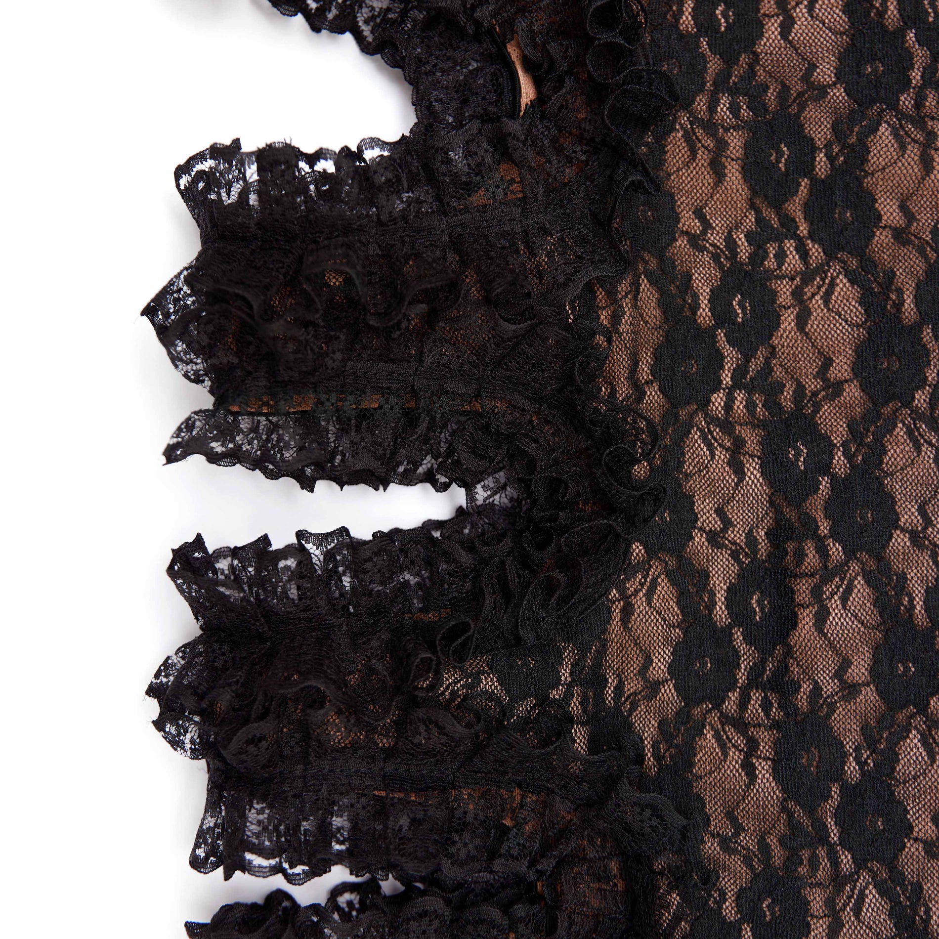 A close up of the fabric for the Black Lace Cut Out Midi Skirt