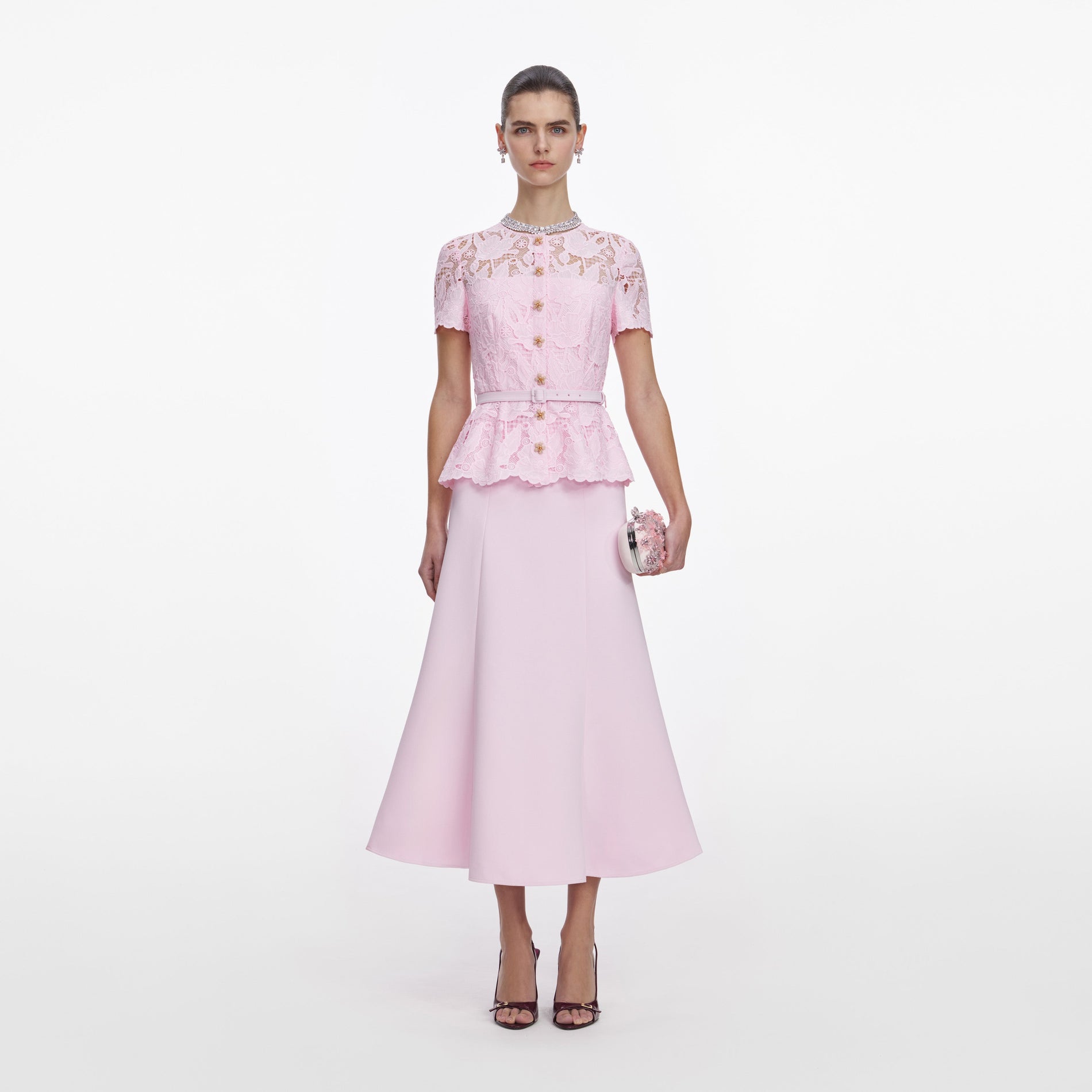 Front view of a woman wearing the Pink Lace Crepe Midi Dress