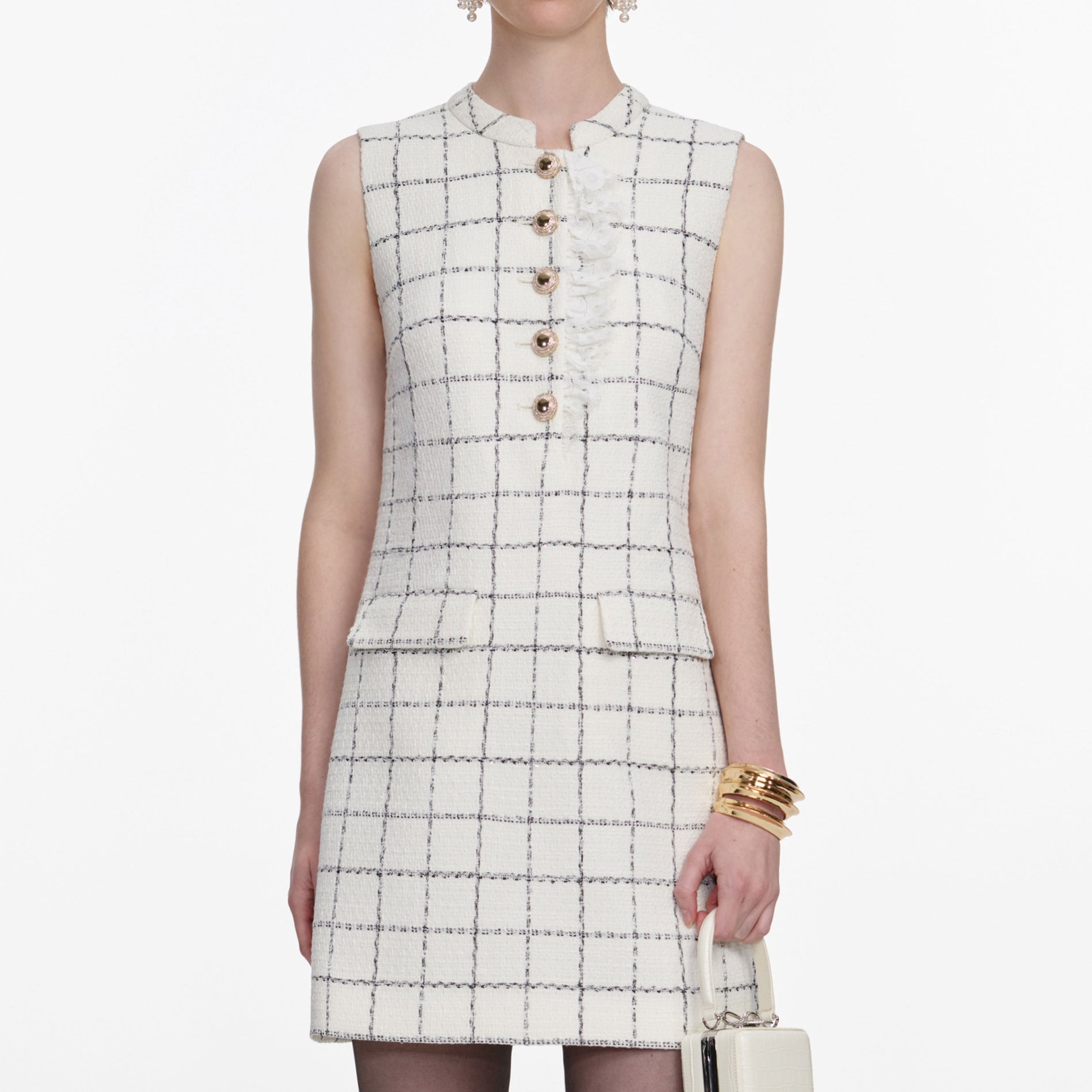 A close up of a woman wearing the Check Boucle Lace Trim Mini Dress