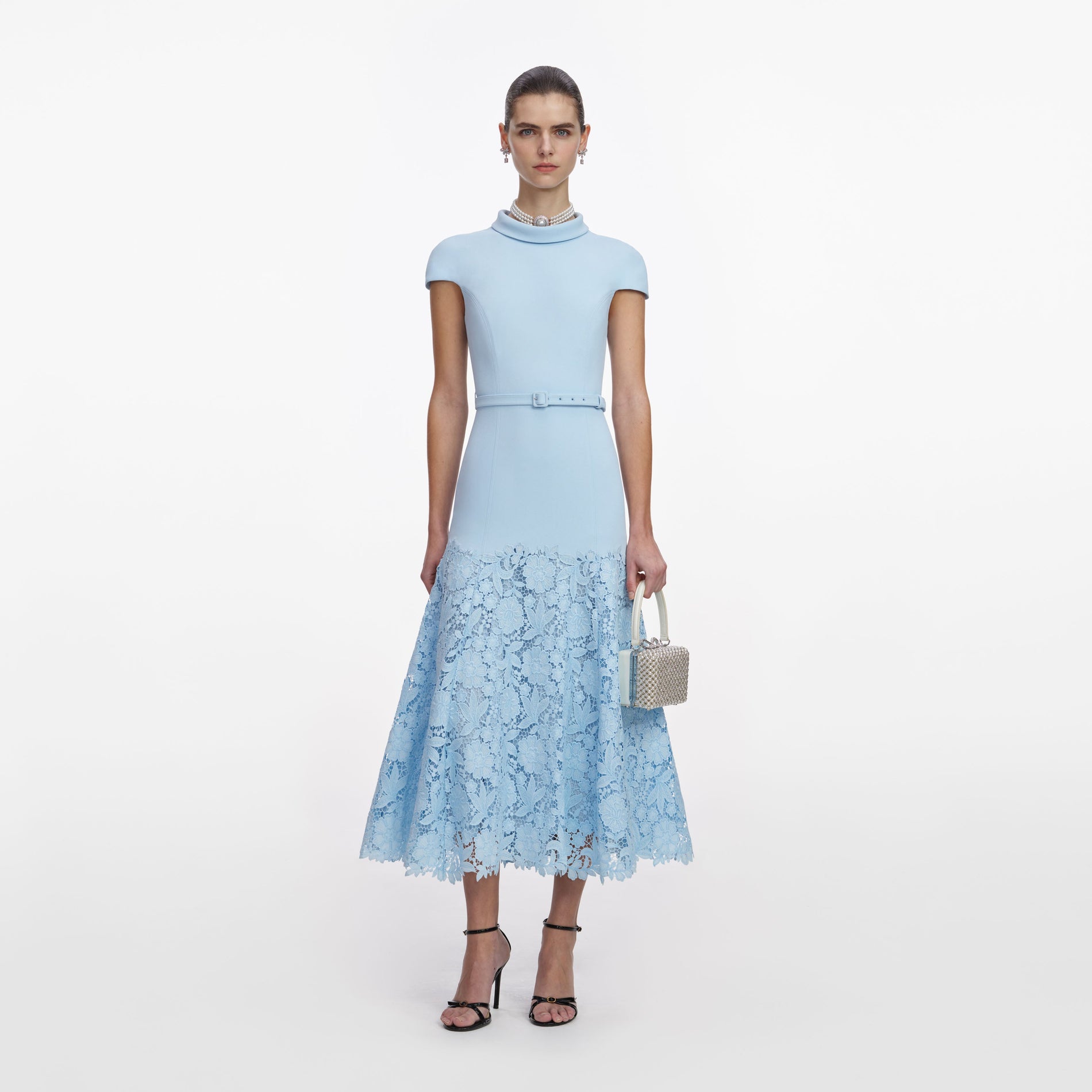 Front view of a woman wearing the Blue Crepe Lace Midi Dress