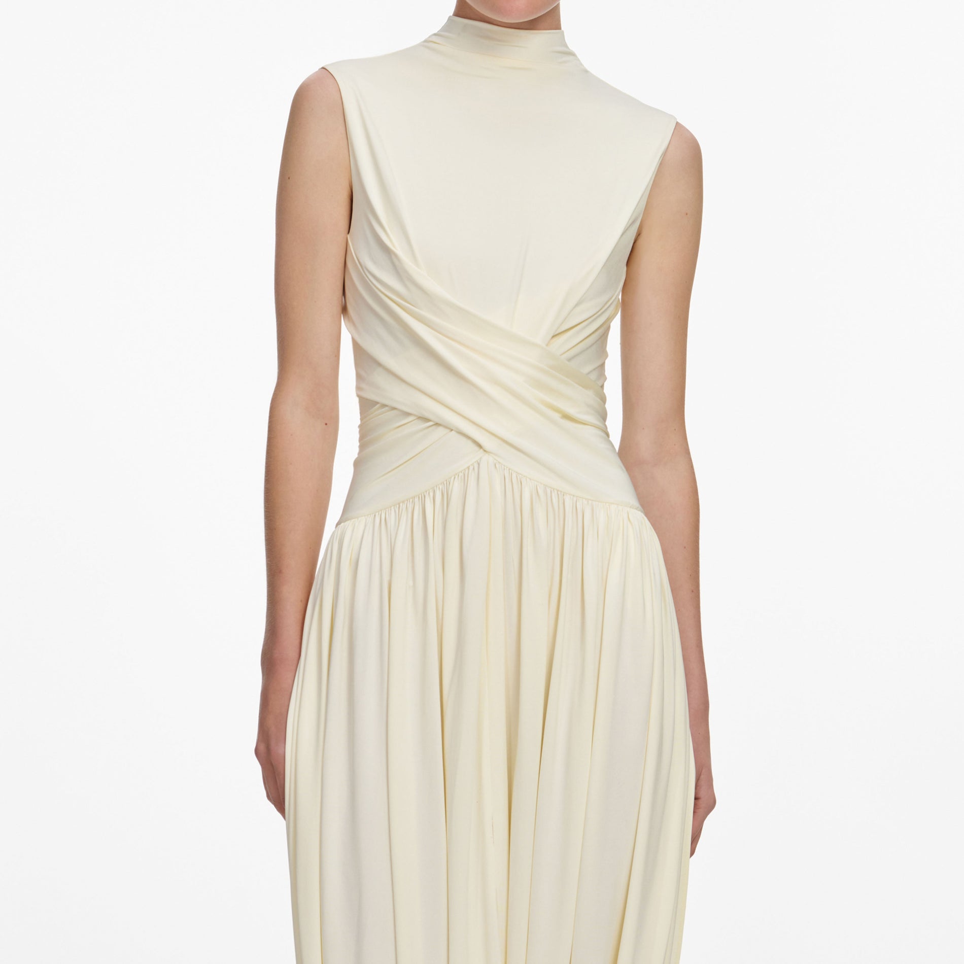 A close up of a woman wearing the Yellow Jersey Wrap Midi Dress