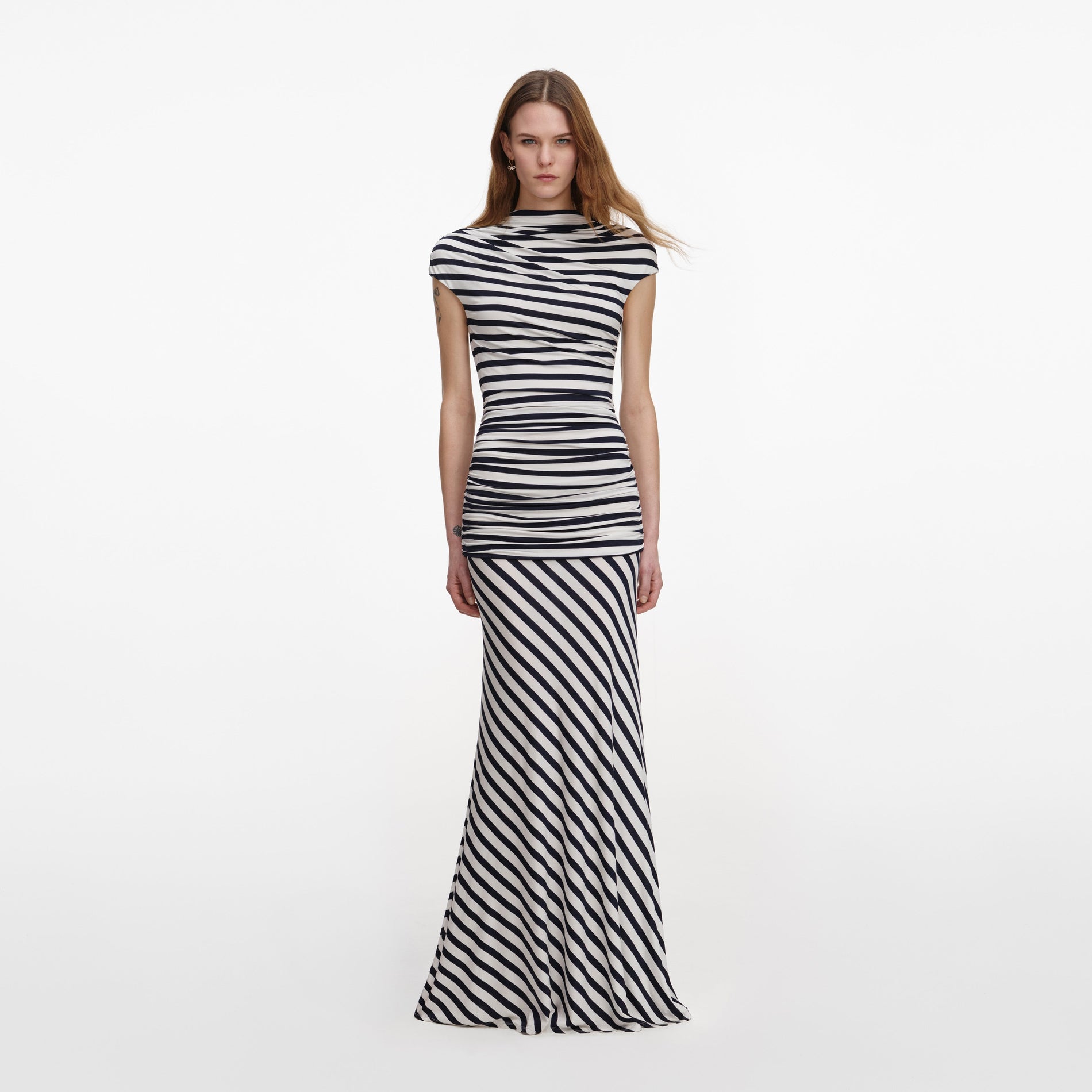 Front view of a woman wearing the Navy Stripe Jersey Maxi Dress