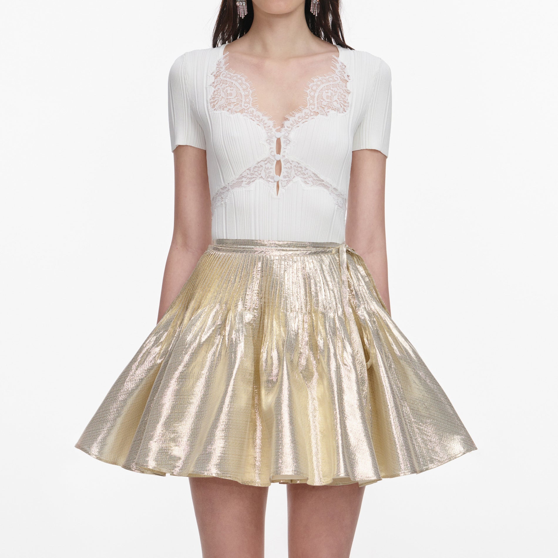 A close up of a woman wearing the White Lace Trim Knit Top