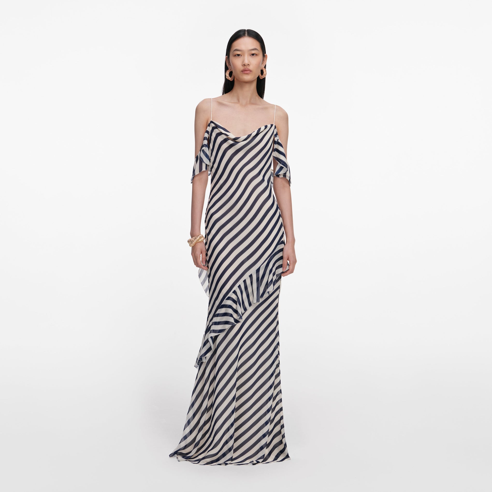 Front view of a woman wearing the Navy Stripe Georgette Maxi Dress