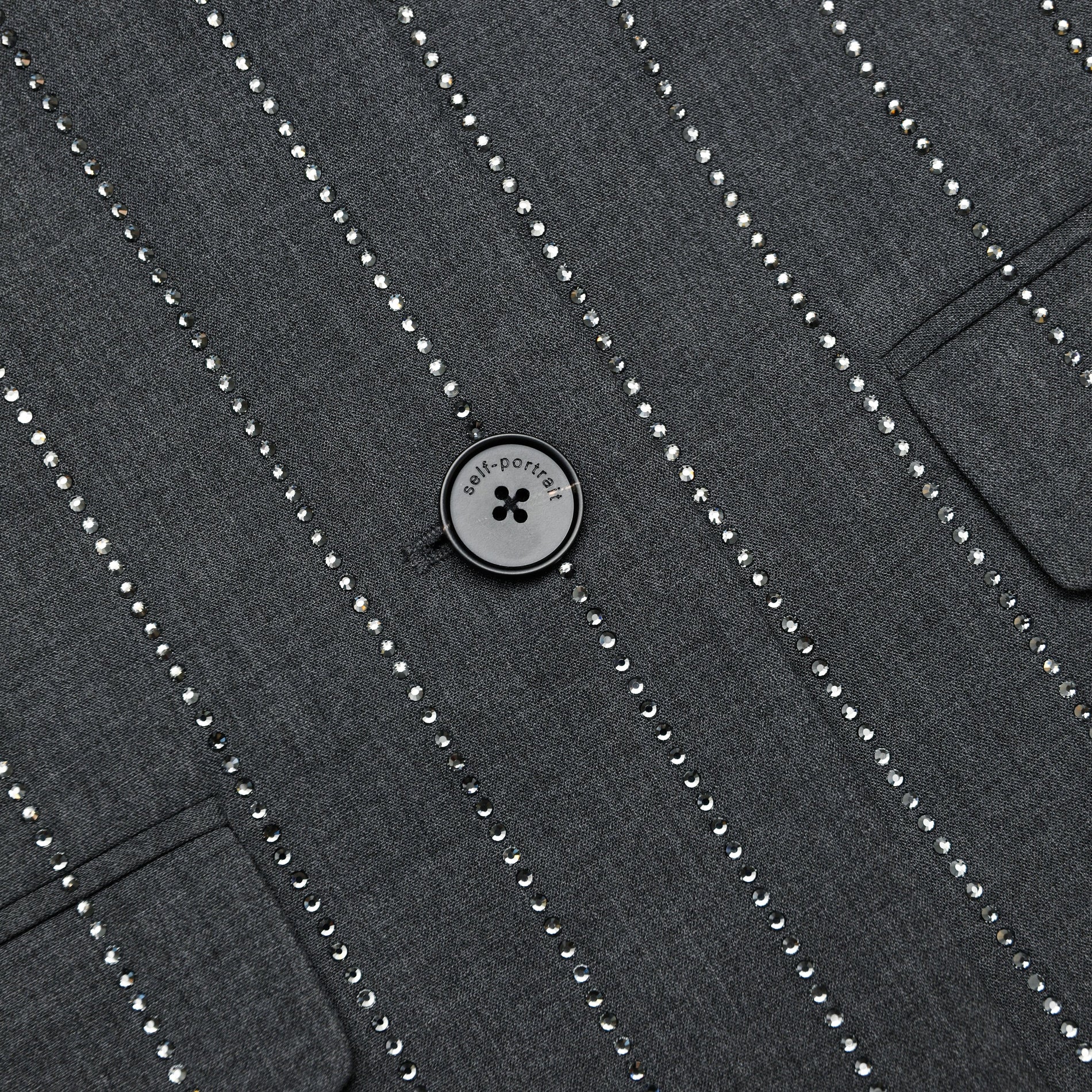 A close up of the fabric for the Grey Rhinestone Pinstripe Blazer